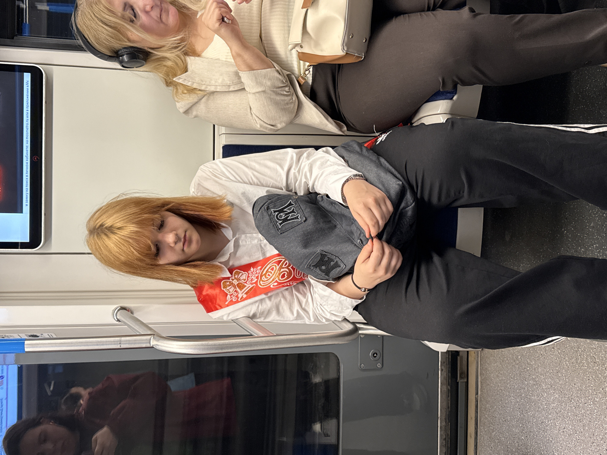 Moscow Metro passenger captures train car interior with digital display