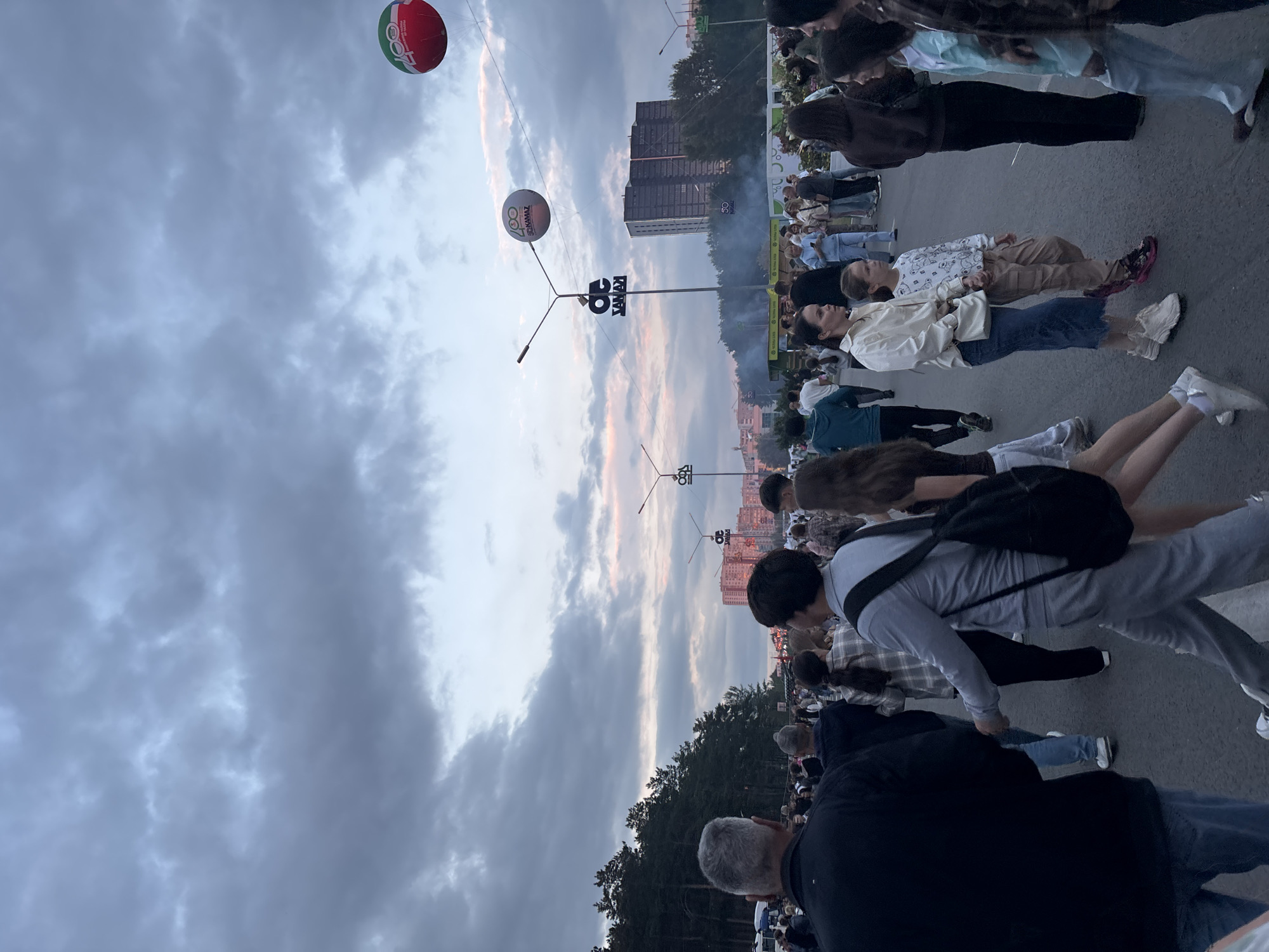 Outdoor street festival draws crowds in Naberezhnye Chelny at dusk
