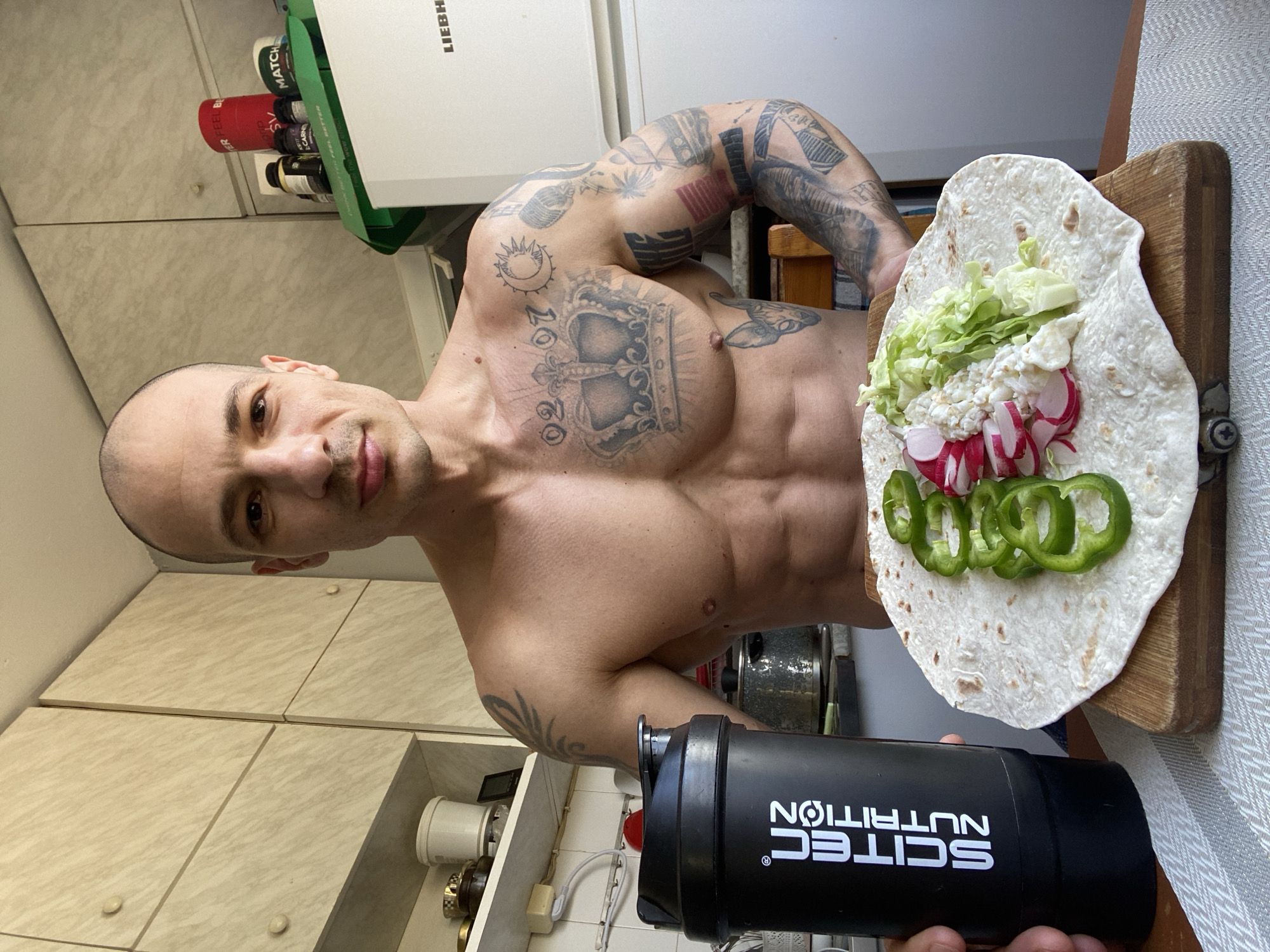 Tattooed man documented in casual indoor moments in Pleven