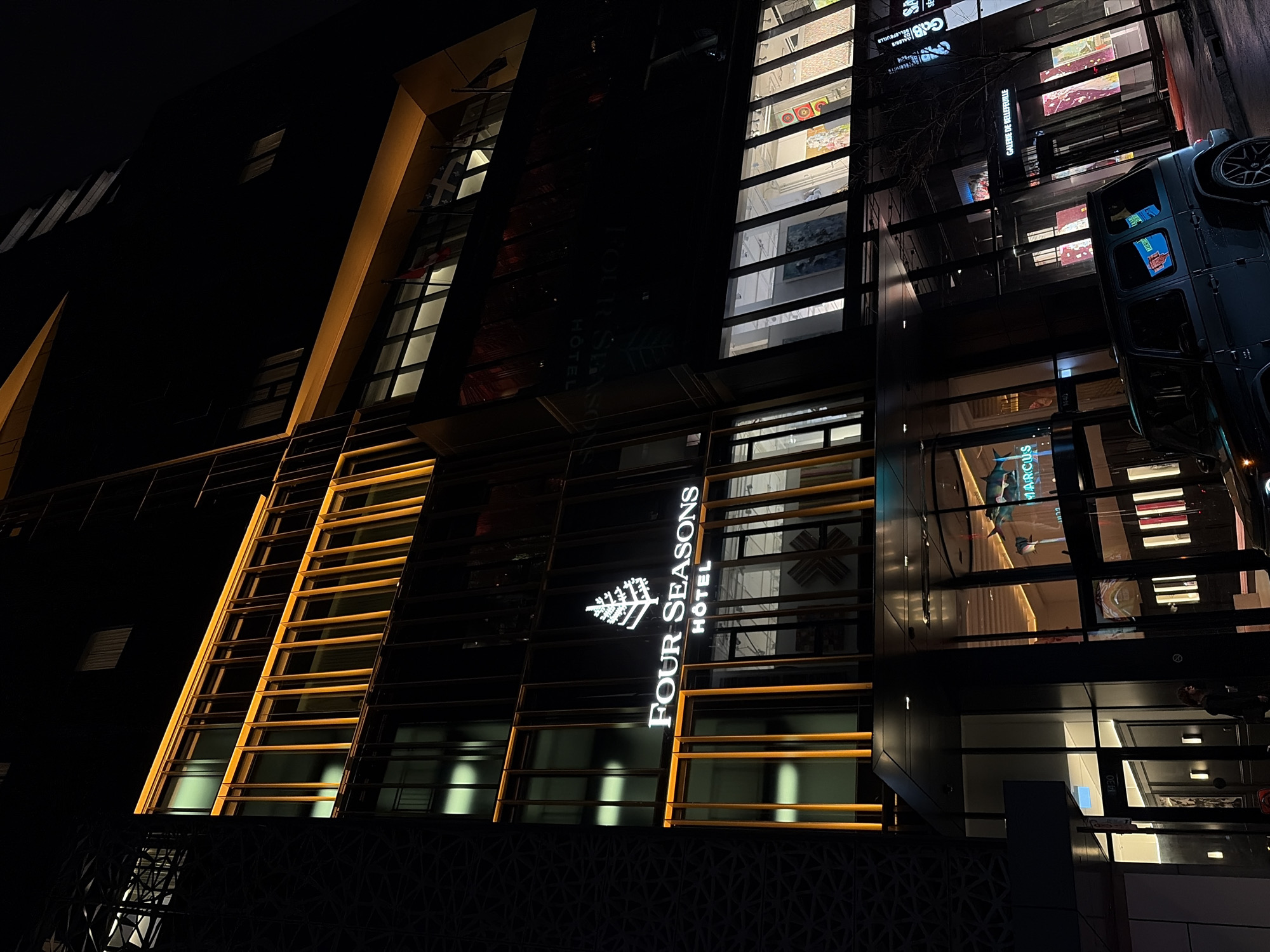 Nighttime architectural lighting observed at Montreal hotels early Sunday morning