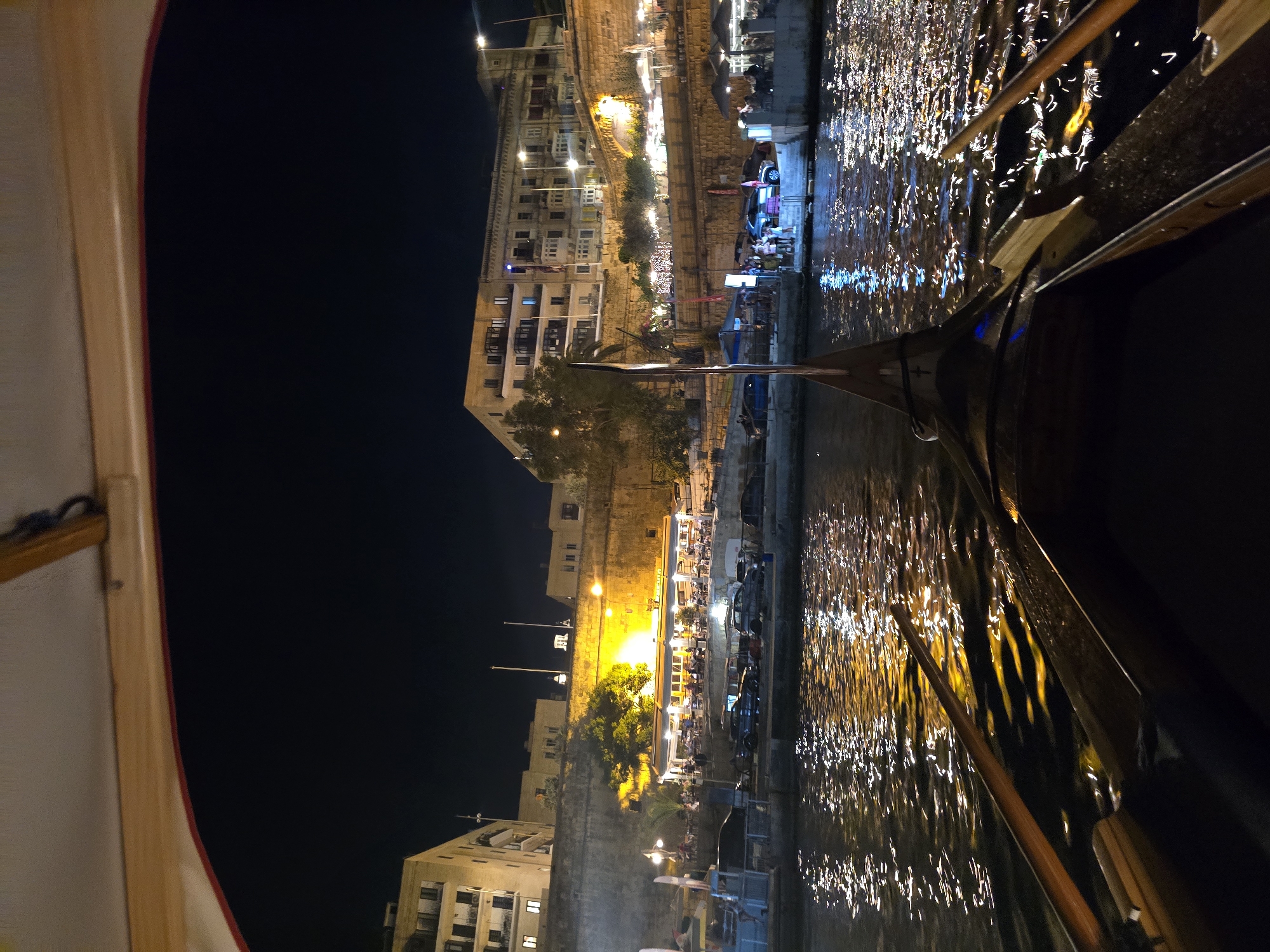 Valletta's Grand Harbour at night, by water and land