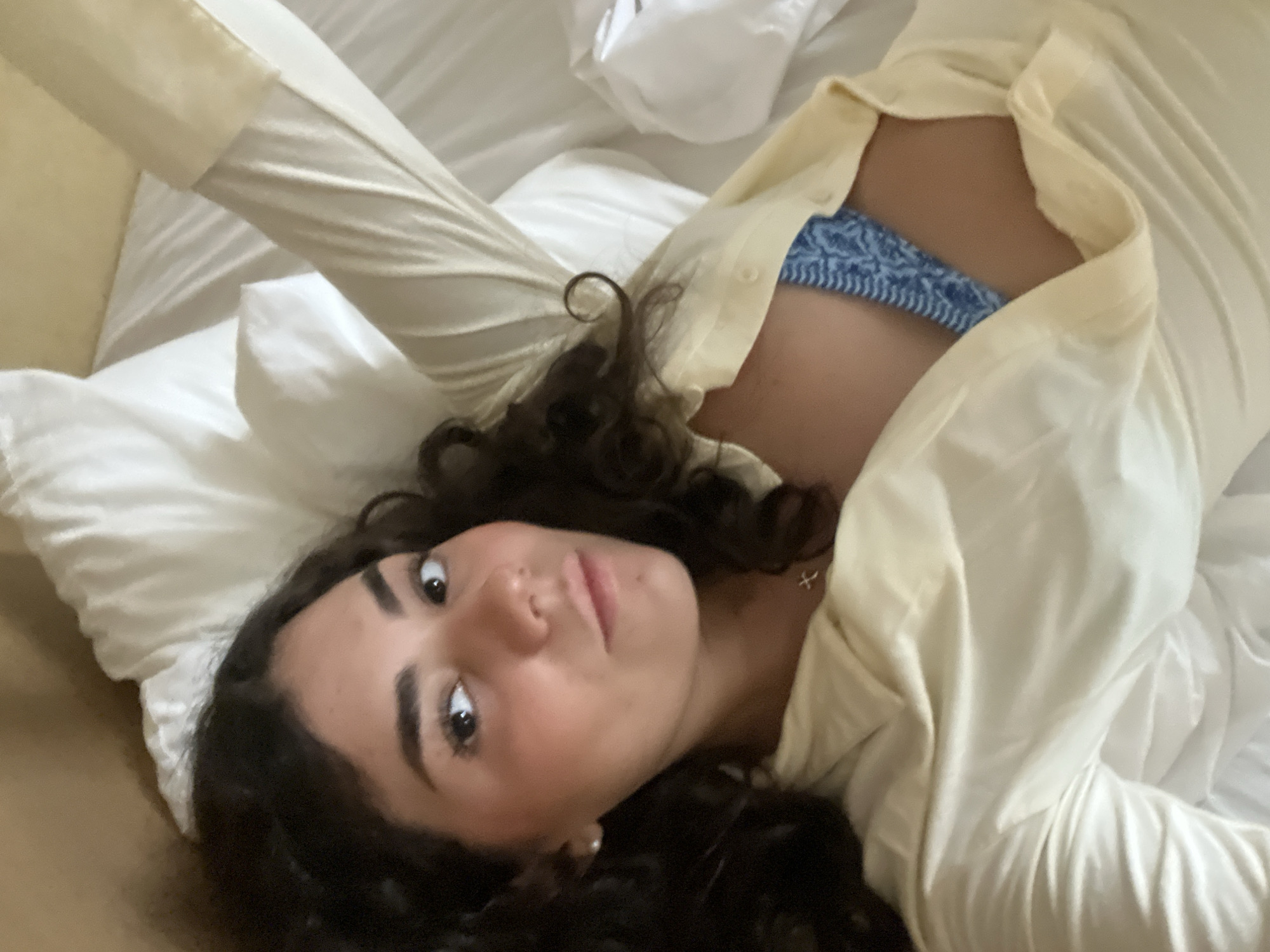 Person resting indoors in Brisas de Zicatela, Mexico
