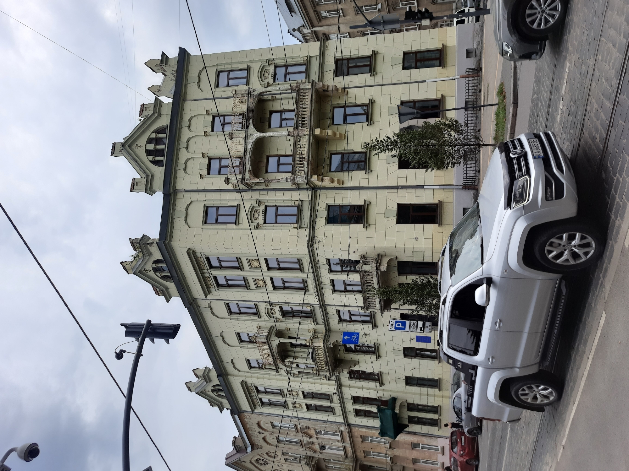 Lviv street facades: ornate buildings on a cloudy afternoon