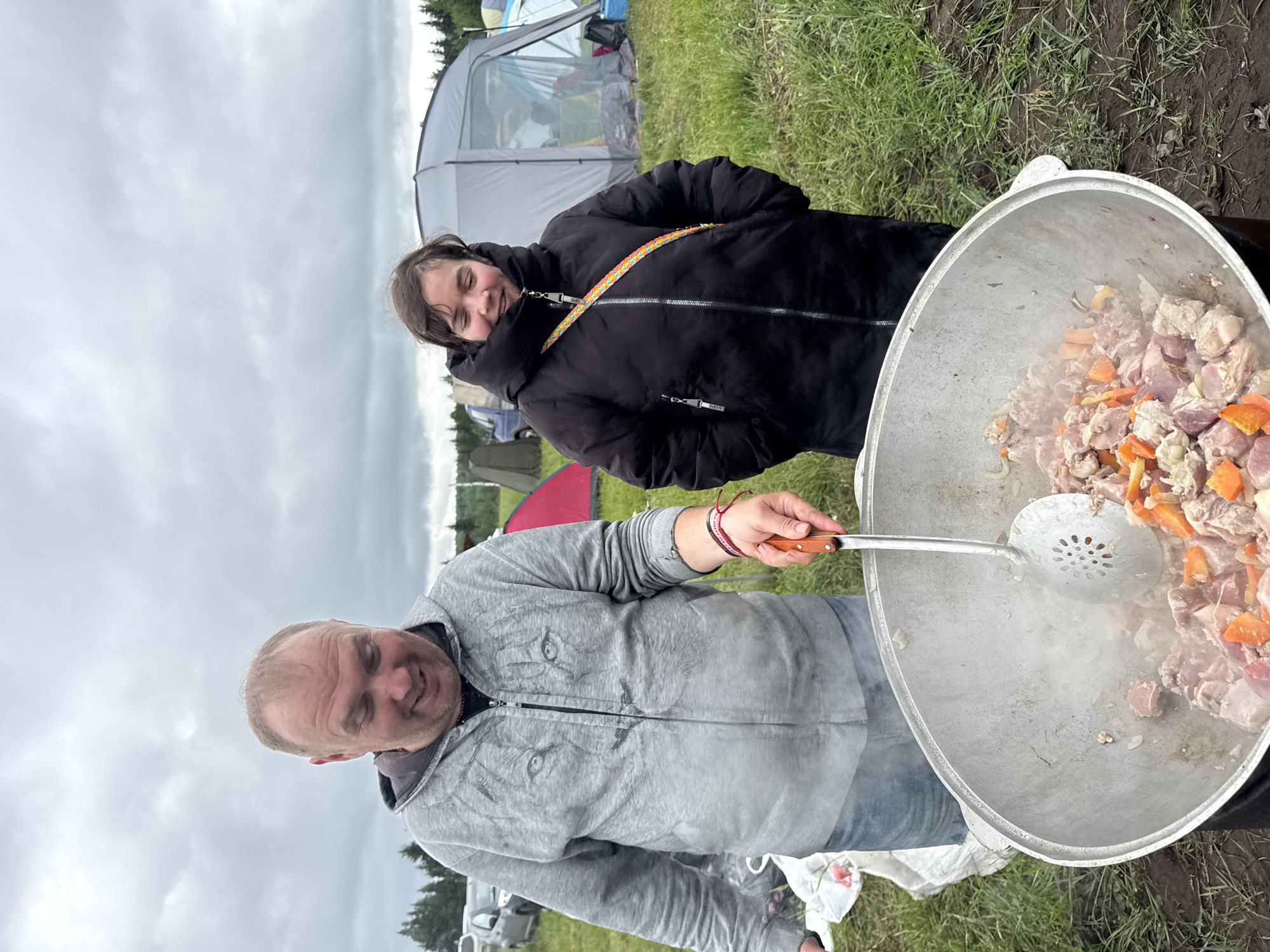 Dawn camping gathering with outdoor cooking in Большая Кивара, Russia