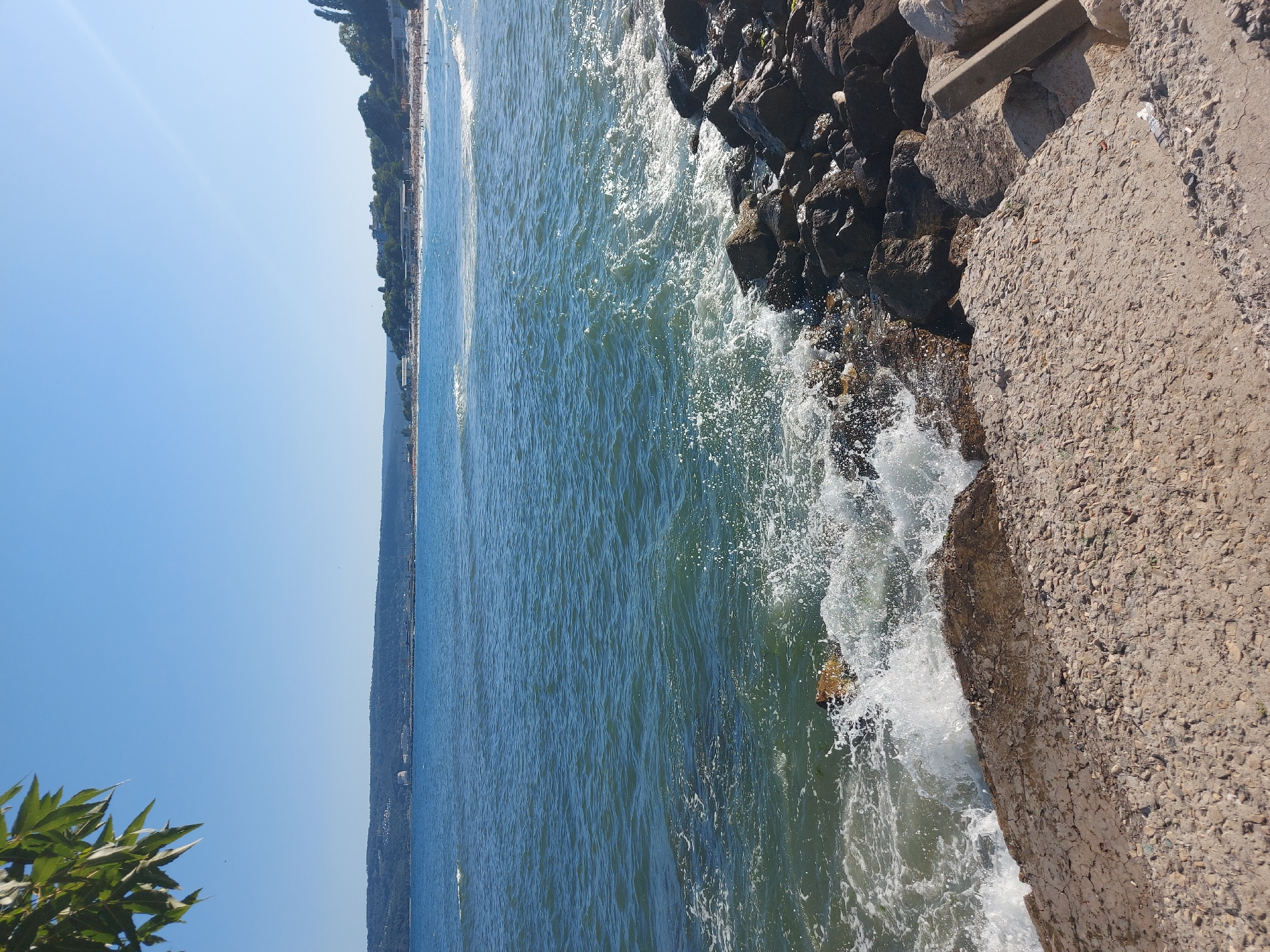 Varna's Black Sea rocky shoreline on a bright summer afternoon