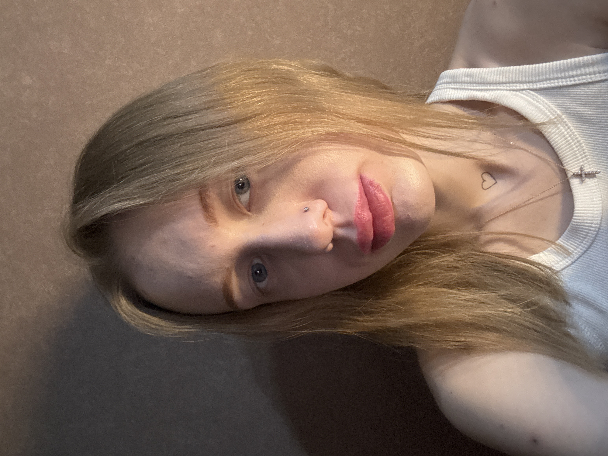 Woman takes multiple selfie portraits in Rostov-on-Don