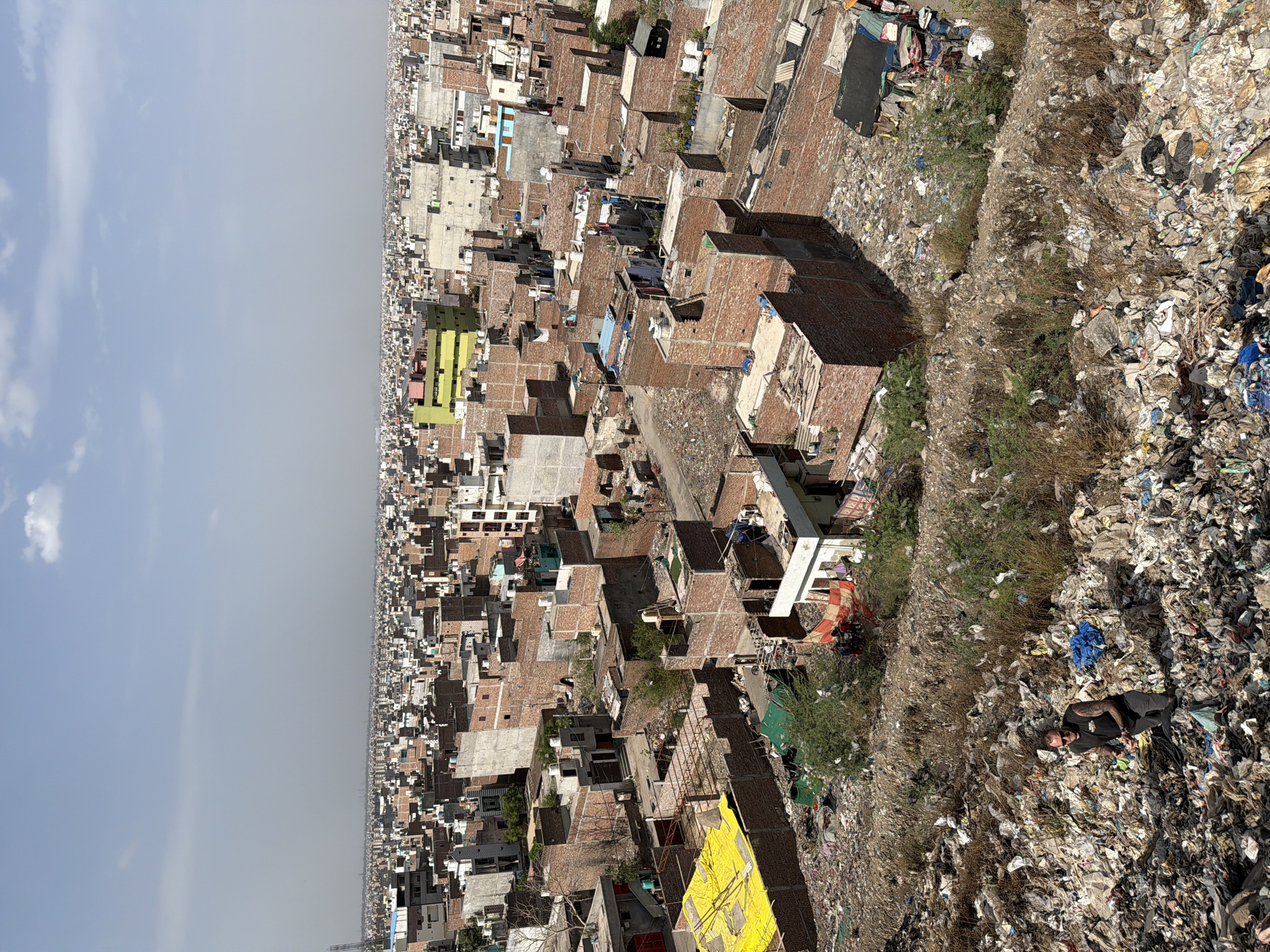 Delhi landfill and surrounding informal neighborhoods, up close
