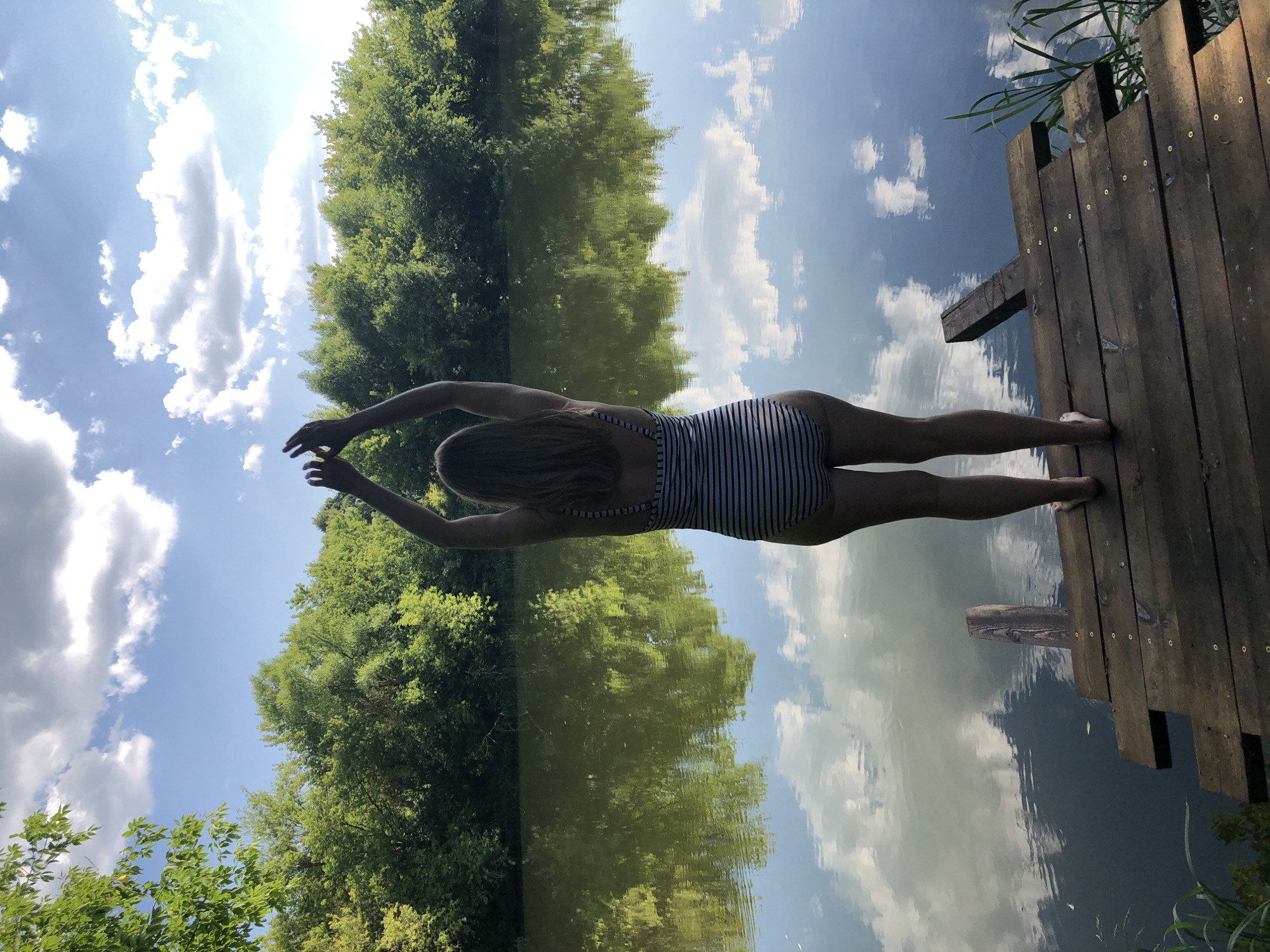 Dockside swimsuit shots and a boxer dog enjoying a snack