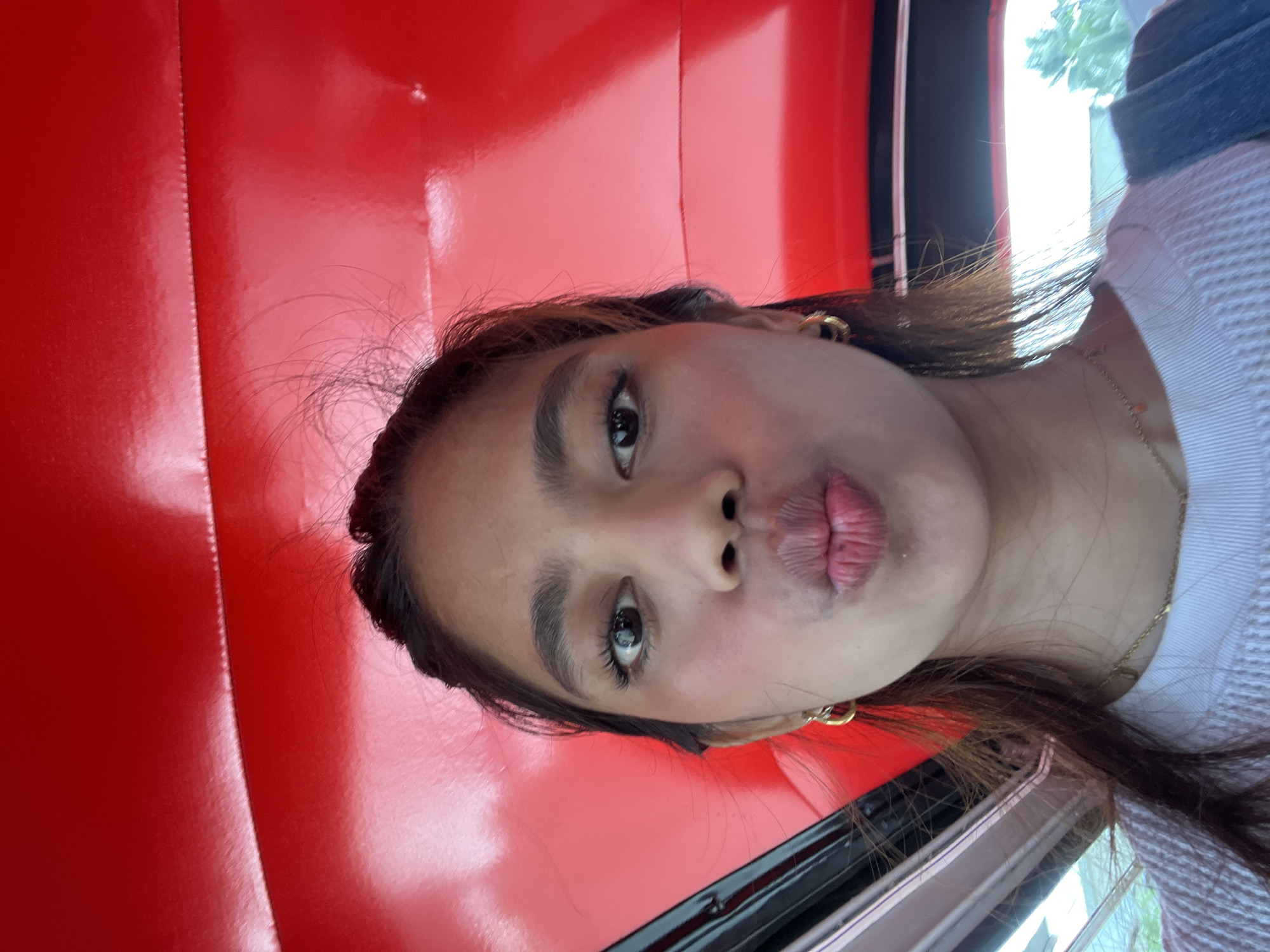Inside and outside a red tricycle in Panabo City