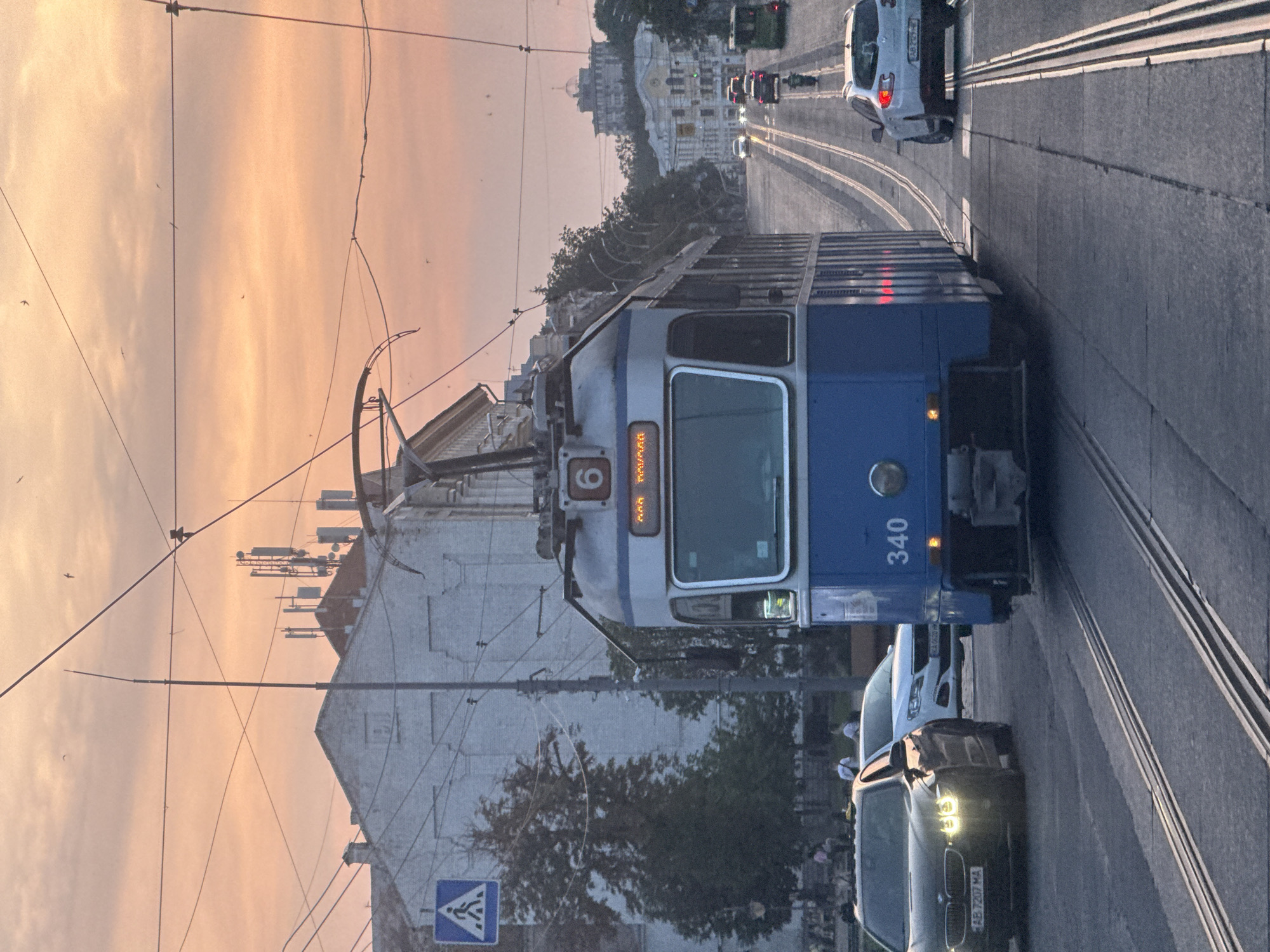 Tram and cathedral at golden hour in Vinnytsia