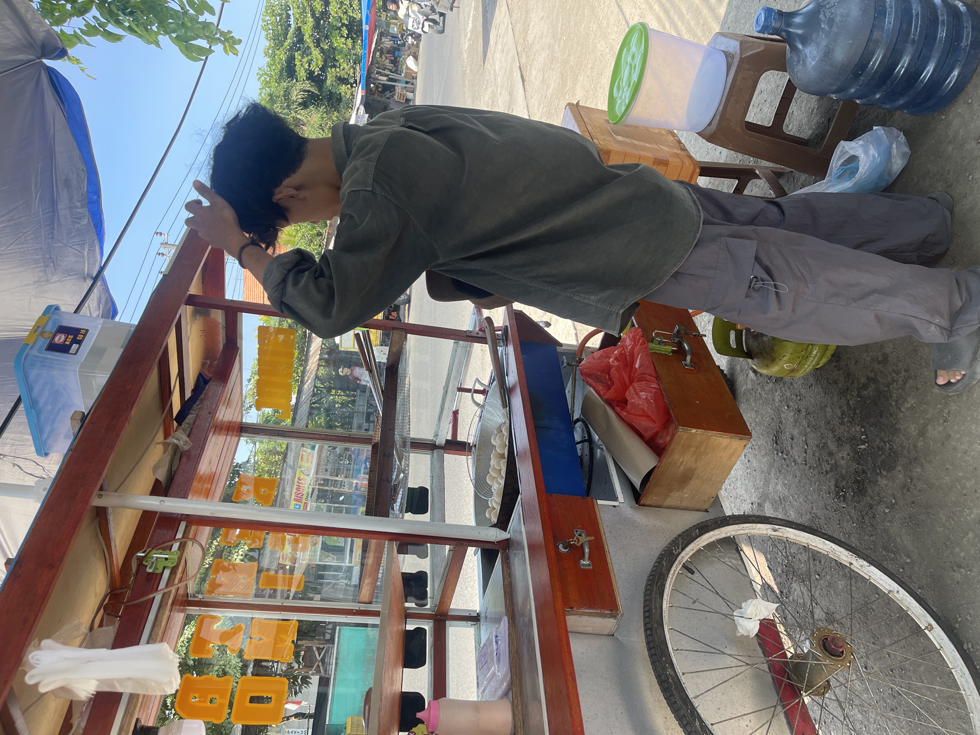 Morning street market activity along a Balongdowo roadside