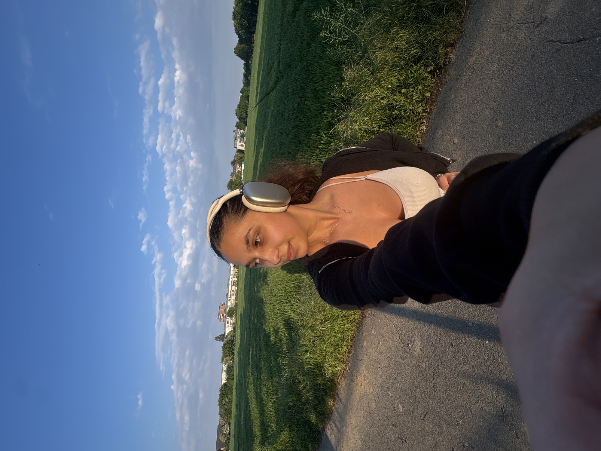 Young woman documents evening walk through Mönchengladbach streets
