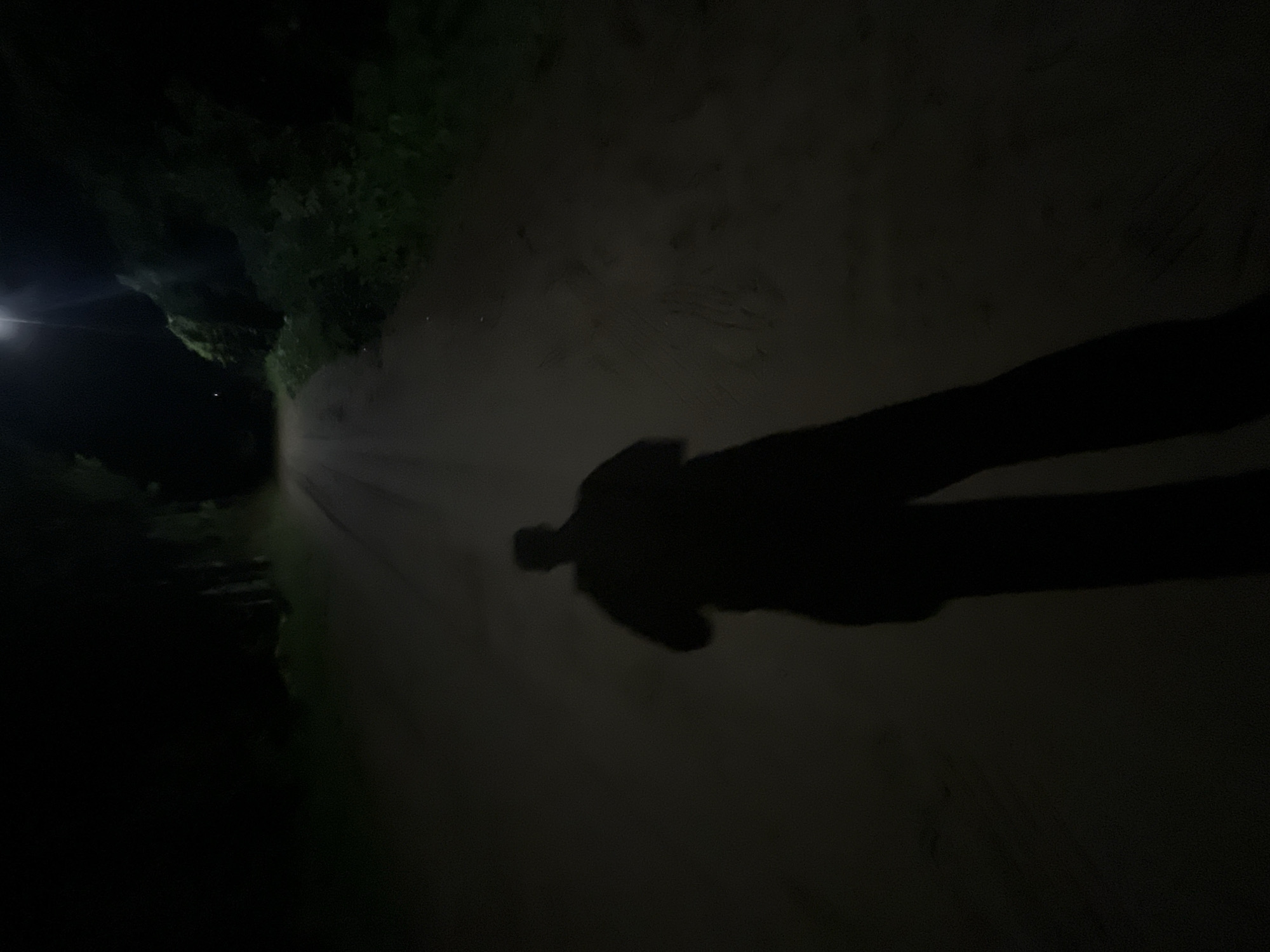 Human shadow captured on unpaved road in Chaikovsky