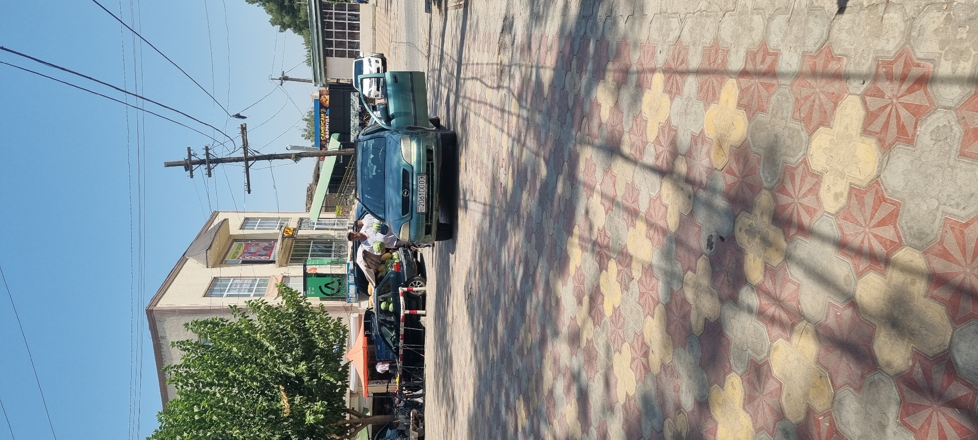 Sunny morning street scene, Ismoili Somoni, Tajikistan