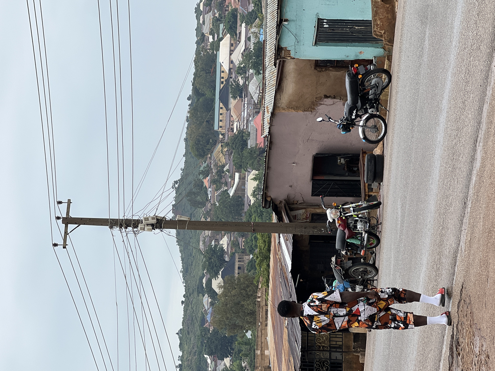 Daily life documented across Jos, Nigeria during rainy morning