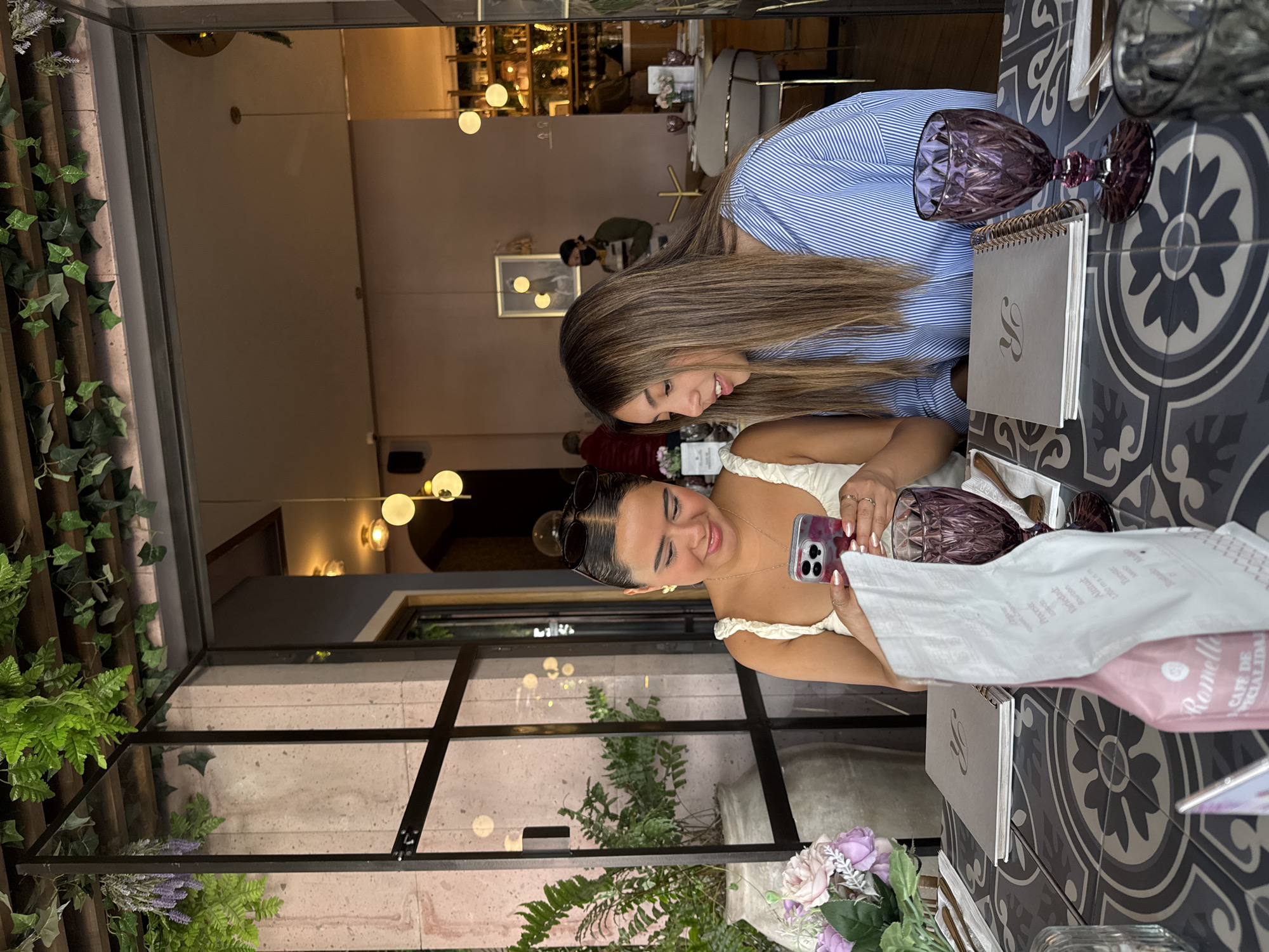 Young women share social dinner at Puebla restaurant