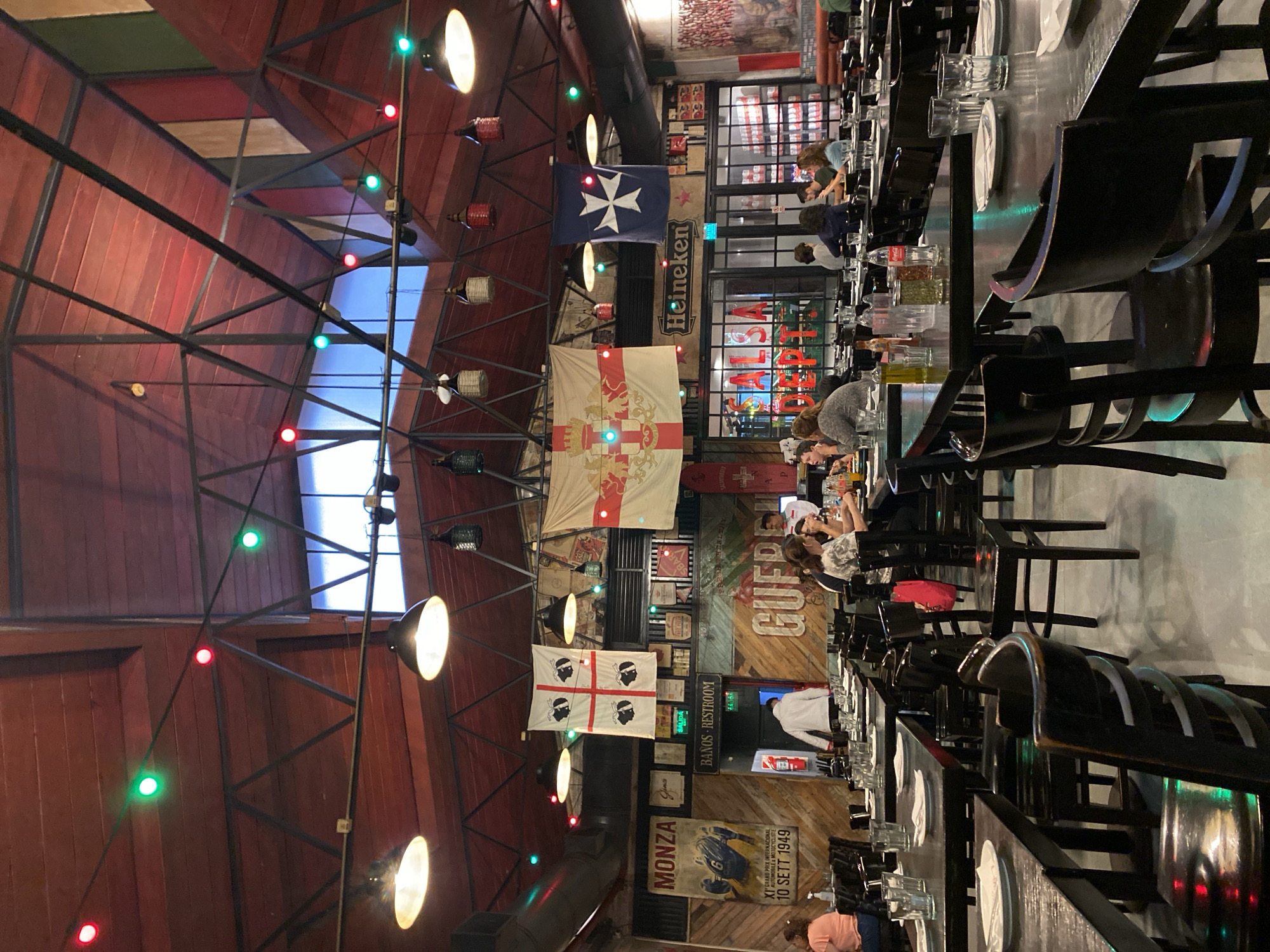 Rainy evening dining and street scenes on Buenos Aires' Corrientes