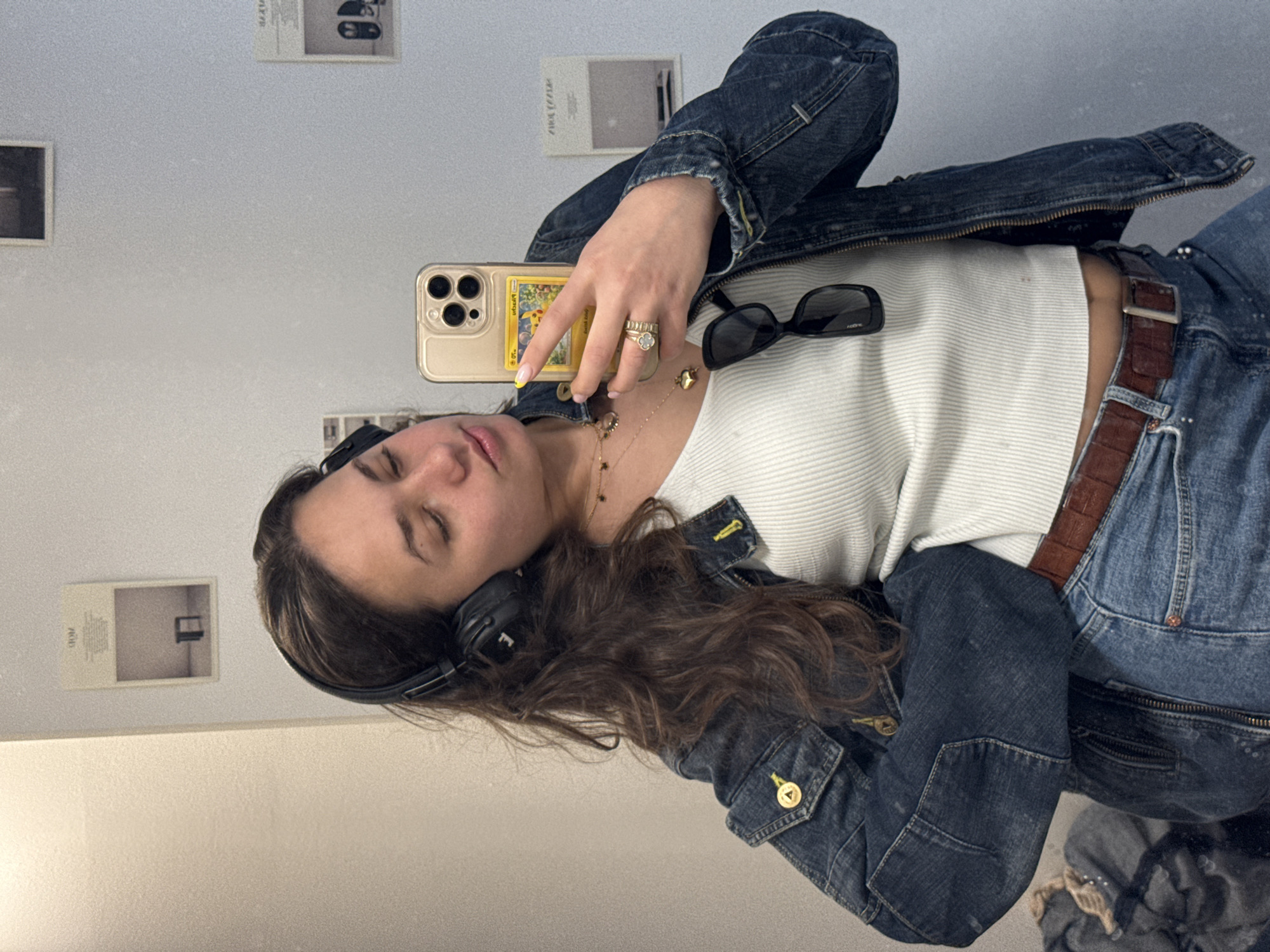 Woman Takes Mirror Selfies at Multiple Milan Indoor Locations