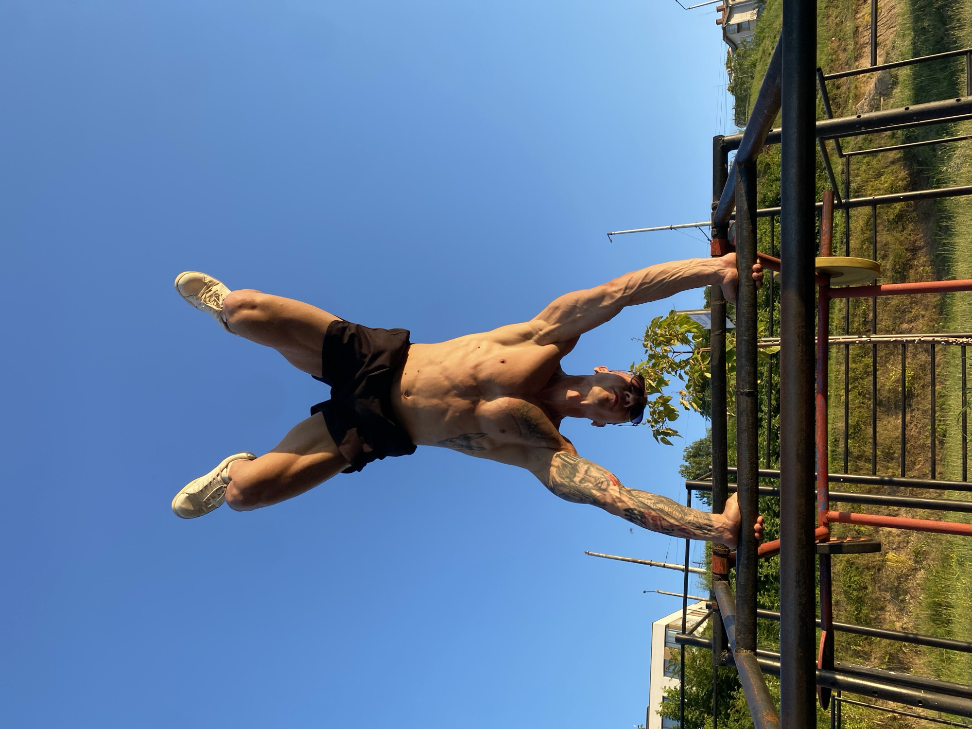 Handstand held on outdoor workout bars in Pleven, Bulgaria