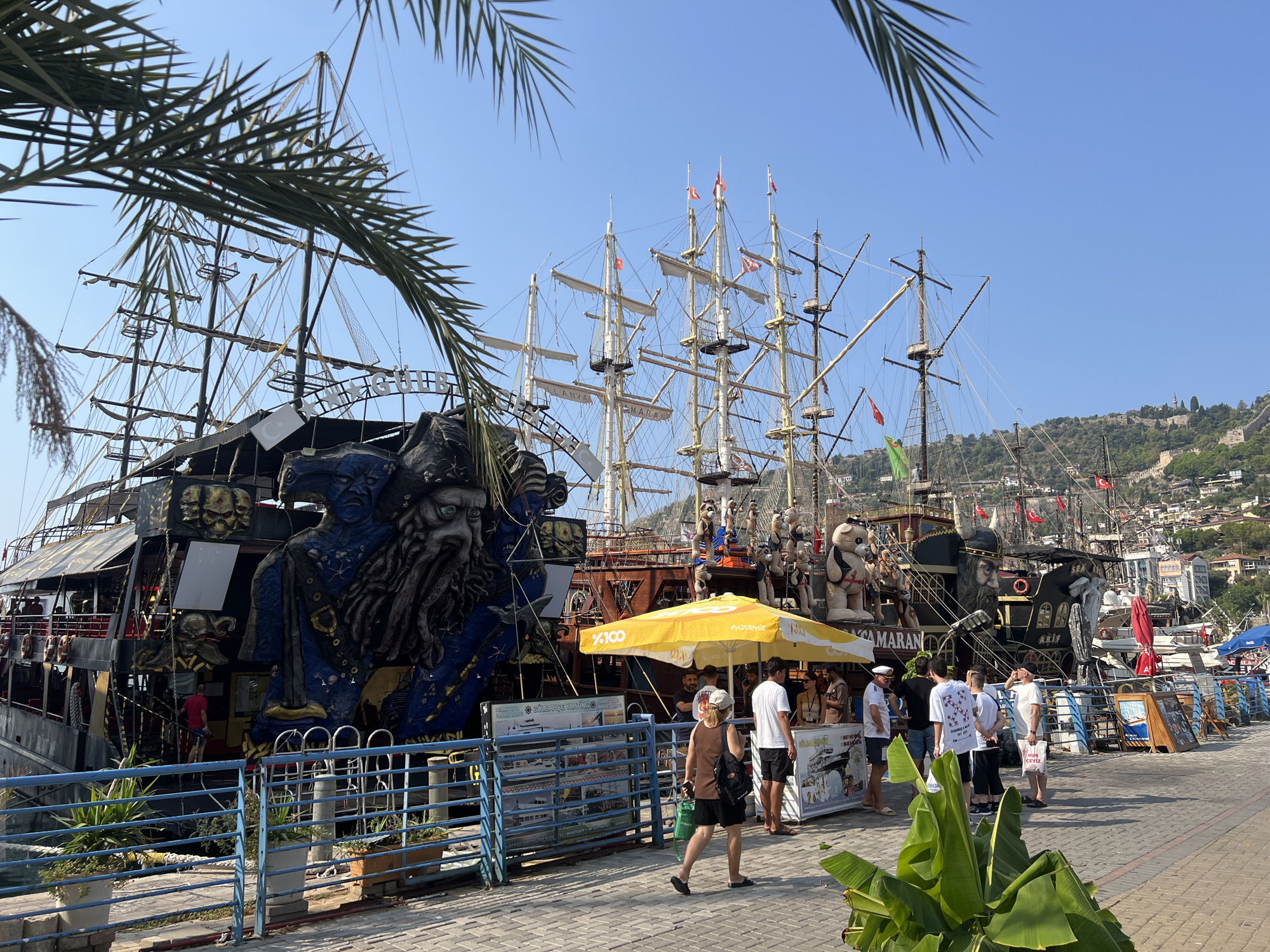 Pirate-themed fleet docked and ready at a harbor pier