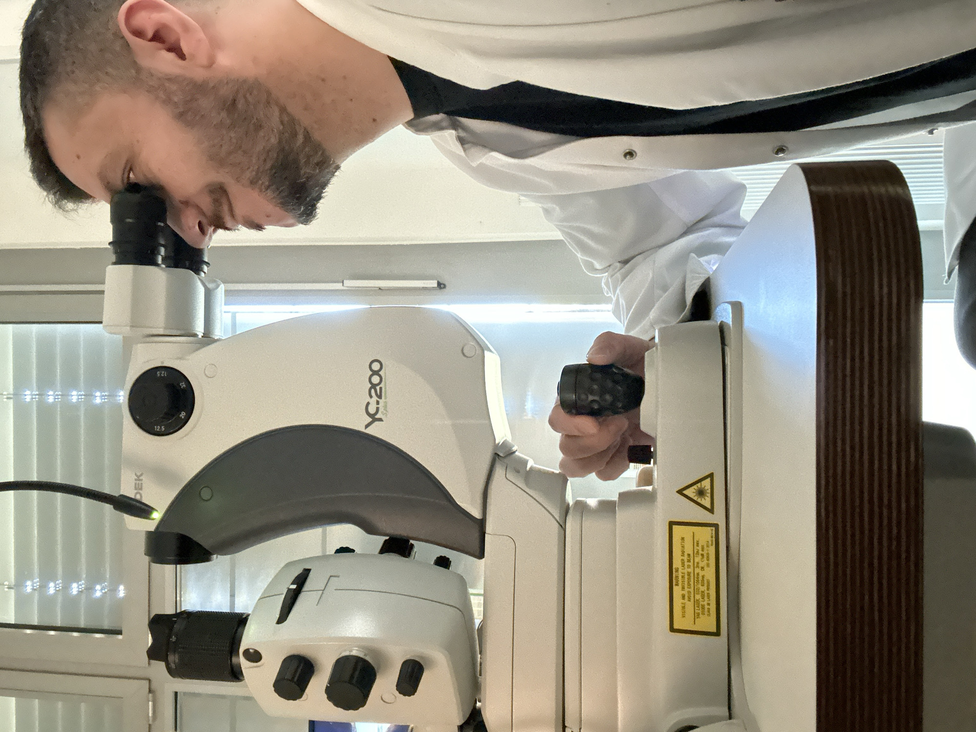 Medical professional operates diagnostic equipment in Berlin clinic