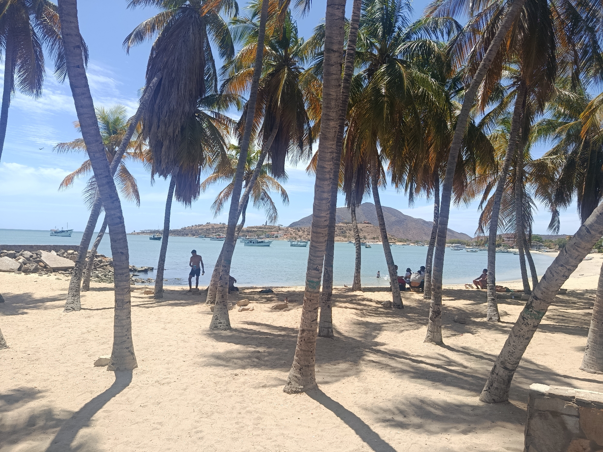 Witness documents sunny afternoon coastal scenes in Juan Griego, Venezuela