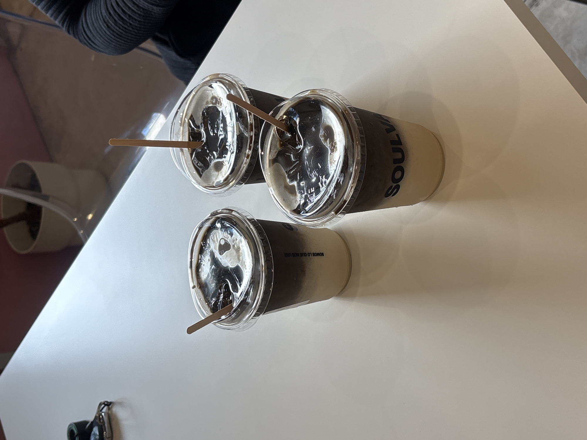 Layered iced lattes at a Puebla café