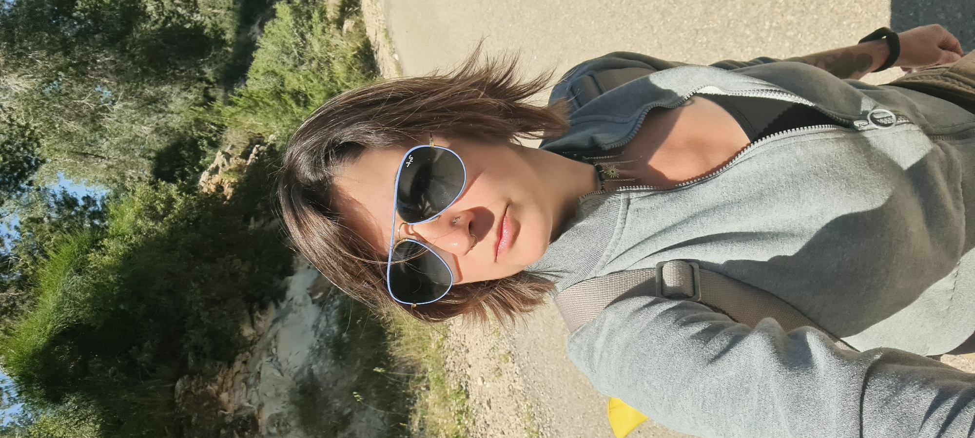 Woman photographed hiking near security fence in rural Israel