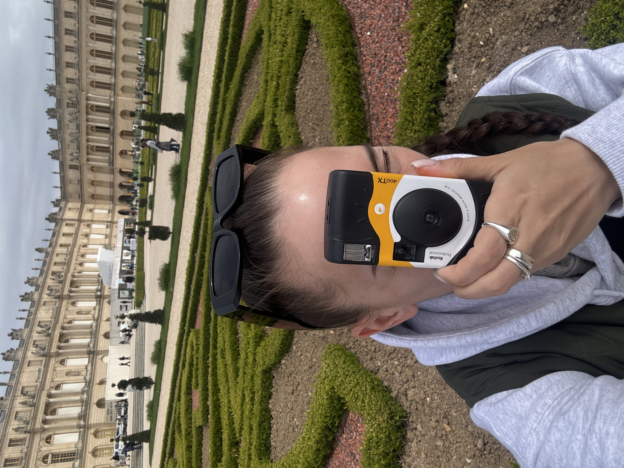 Tourist captures Palace of Versailles with vintage Kodak camera