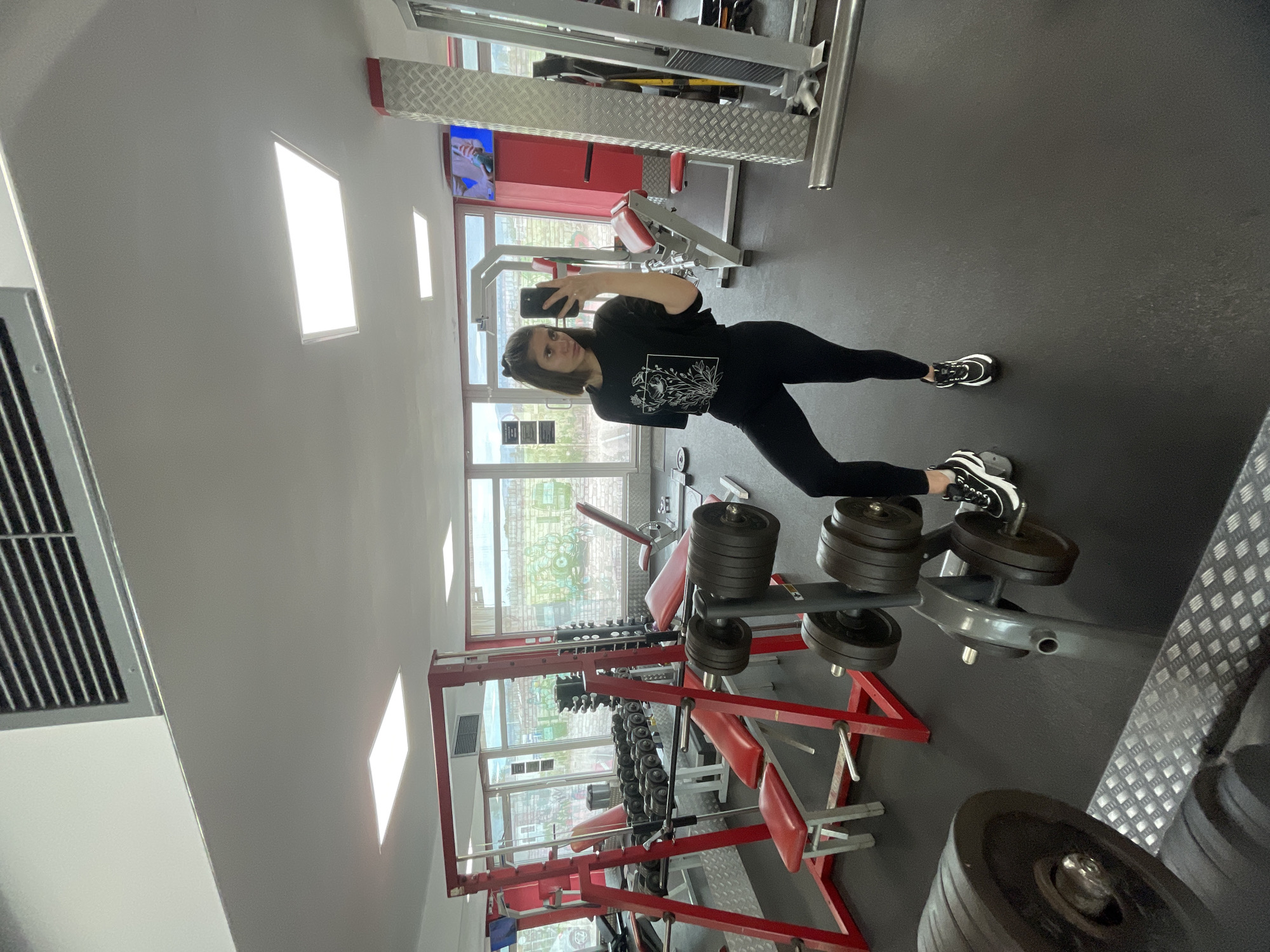 Woman takes gym selfies in Sofia fitness center
