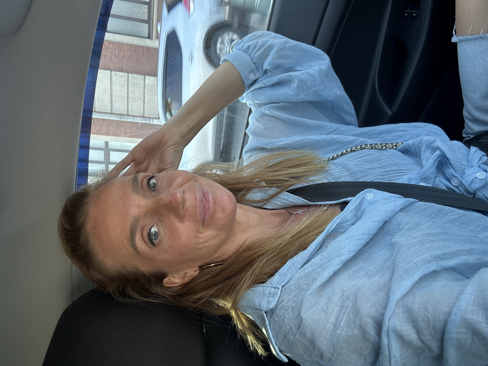 Goofing around in a car near Smolny Cathedral, Saint Petersburg