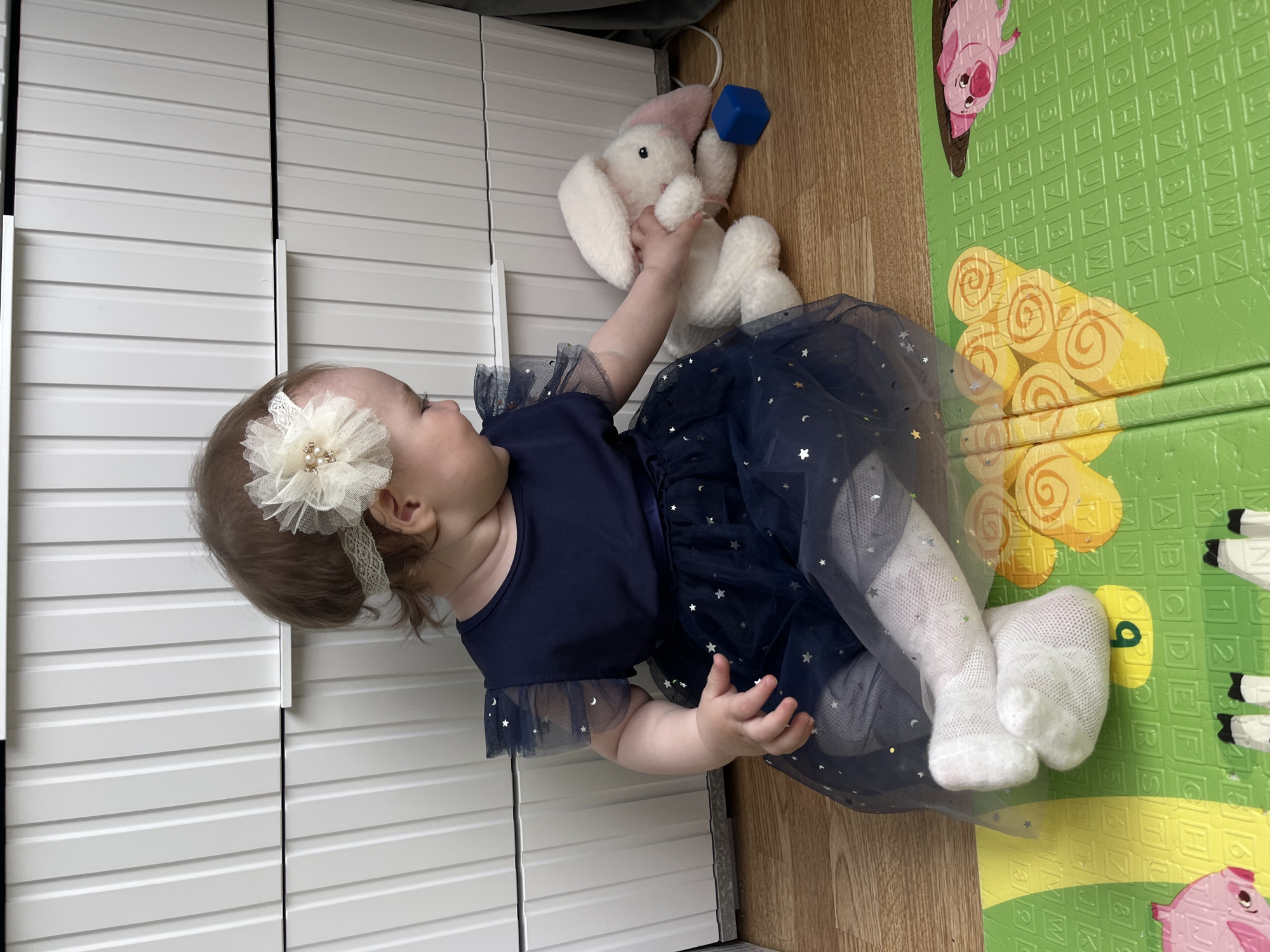 Toddler's playtime documented in two outfits in Shushary, Russia