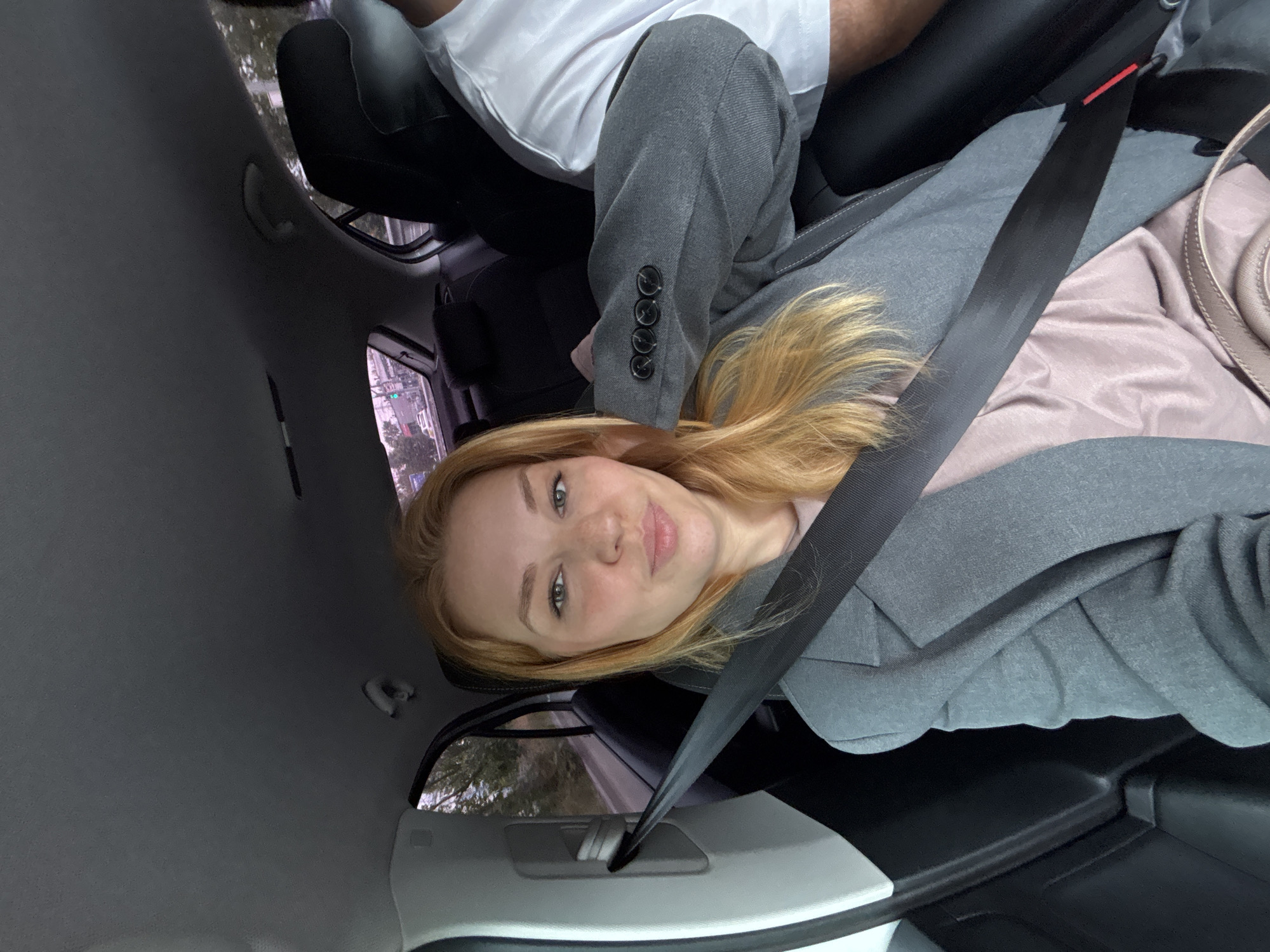 Car ride and street scenes through Zhukovo on a cloudy morning