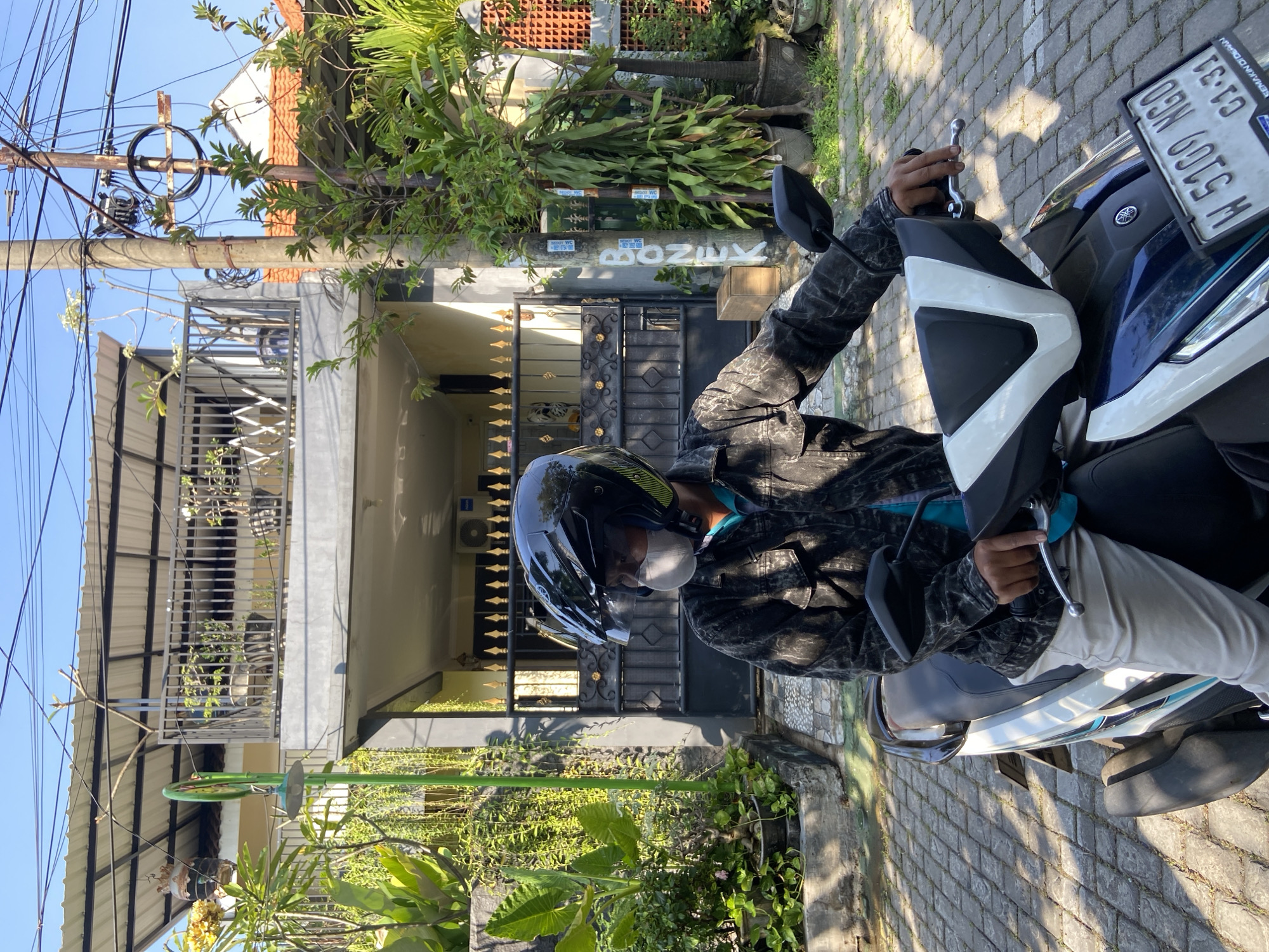 Mixed scenes from Gelam: selfies, card games, motorcycle break