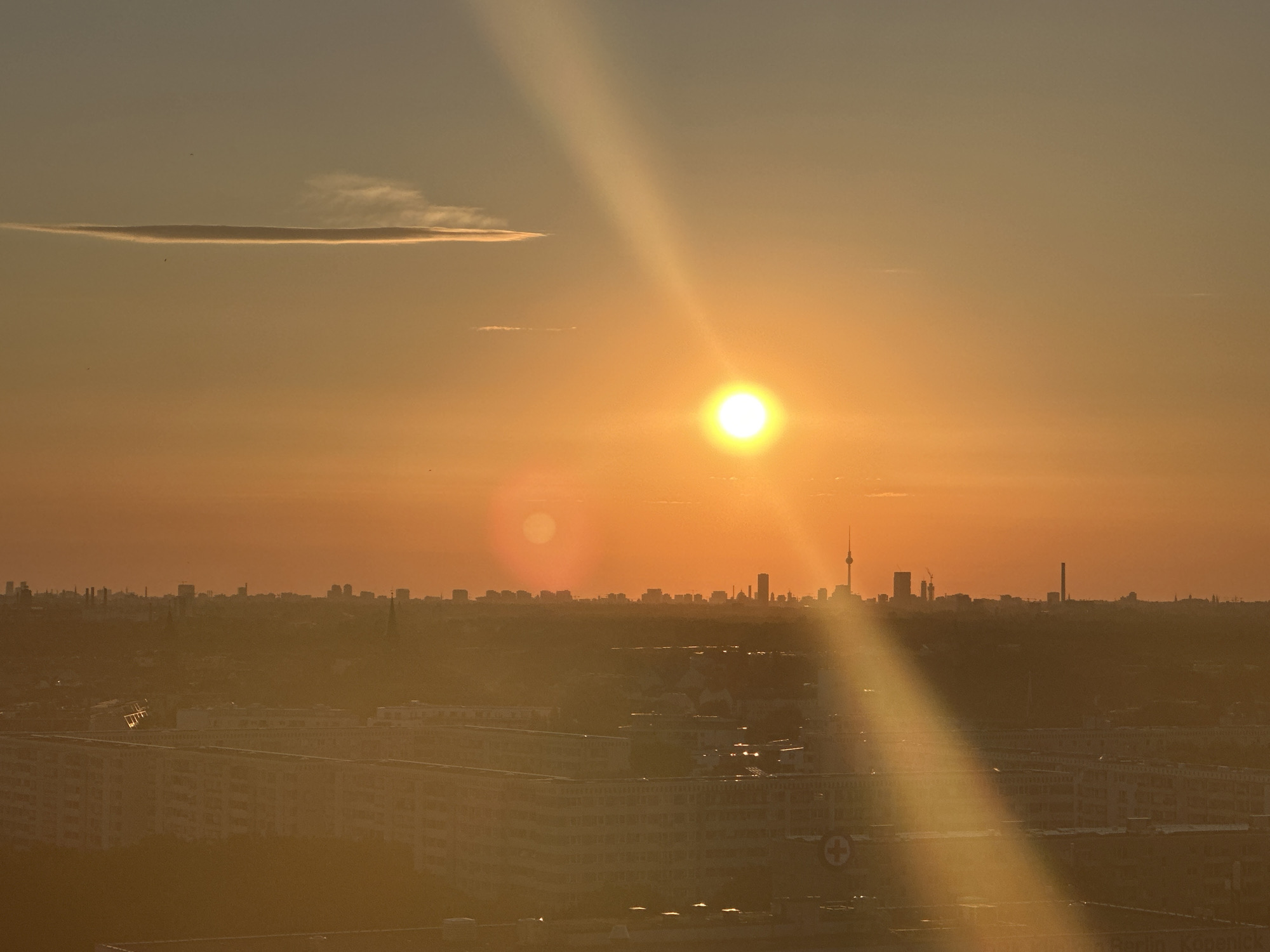 Berlin skyline at golden hour, Fernsehturm centered in the glow