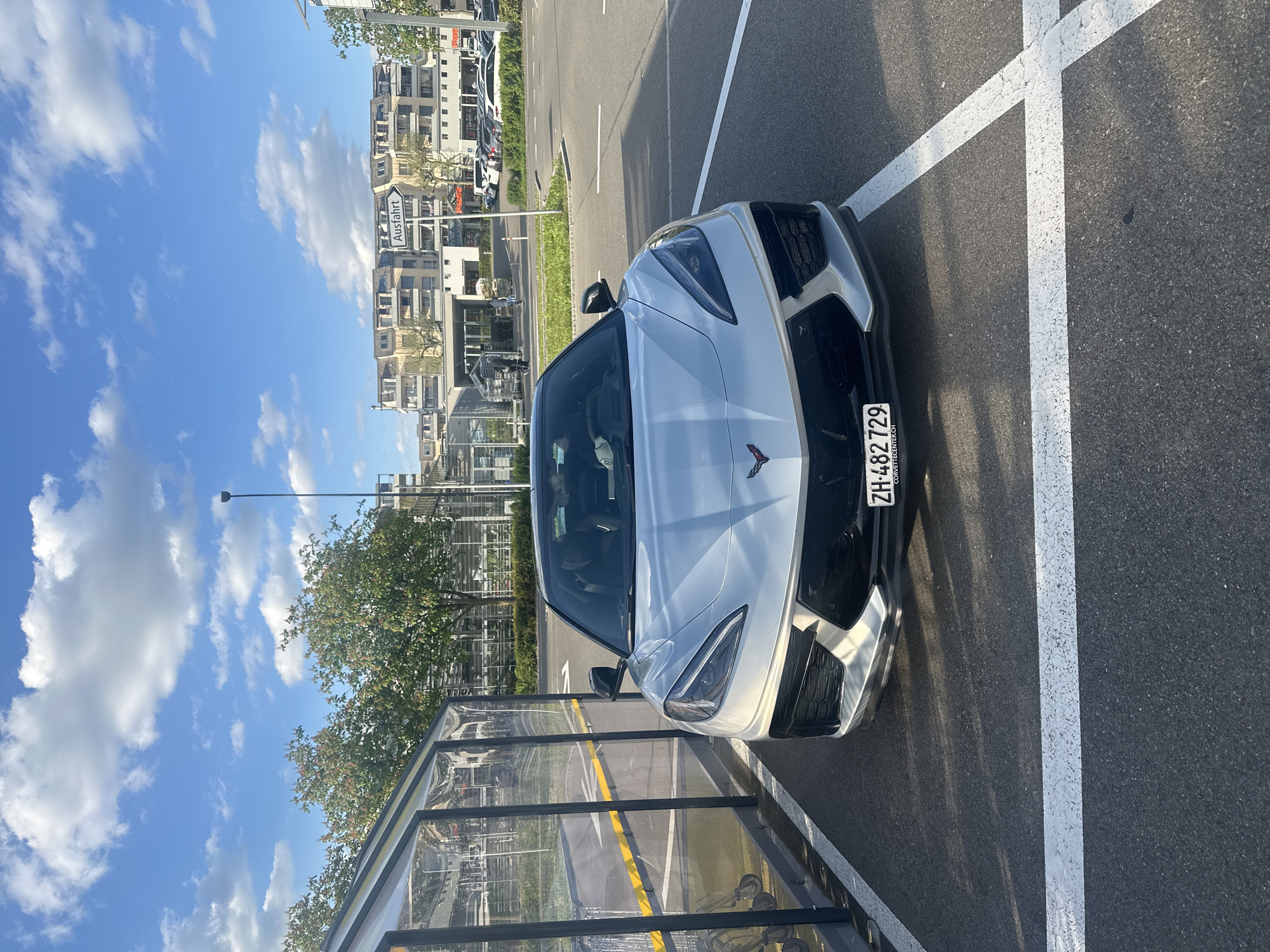 Corvette C8 photographed from multiple angles in Swiss parking lot