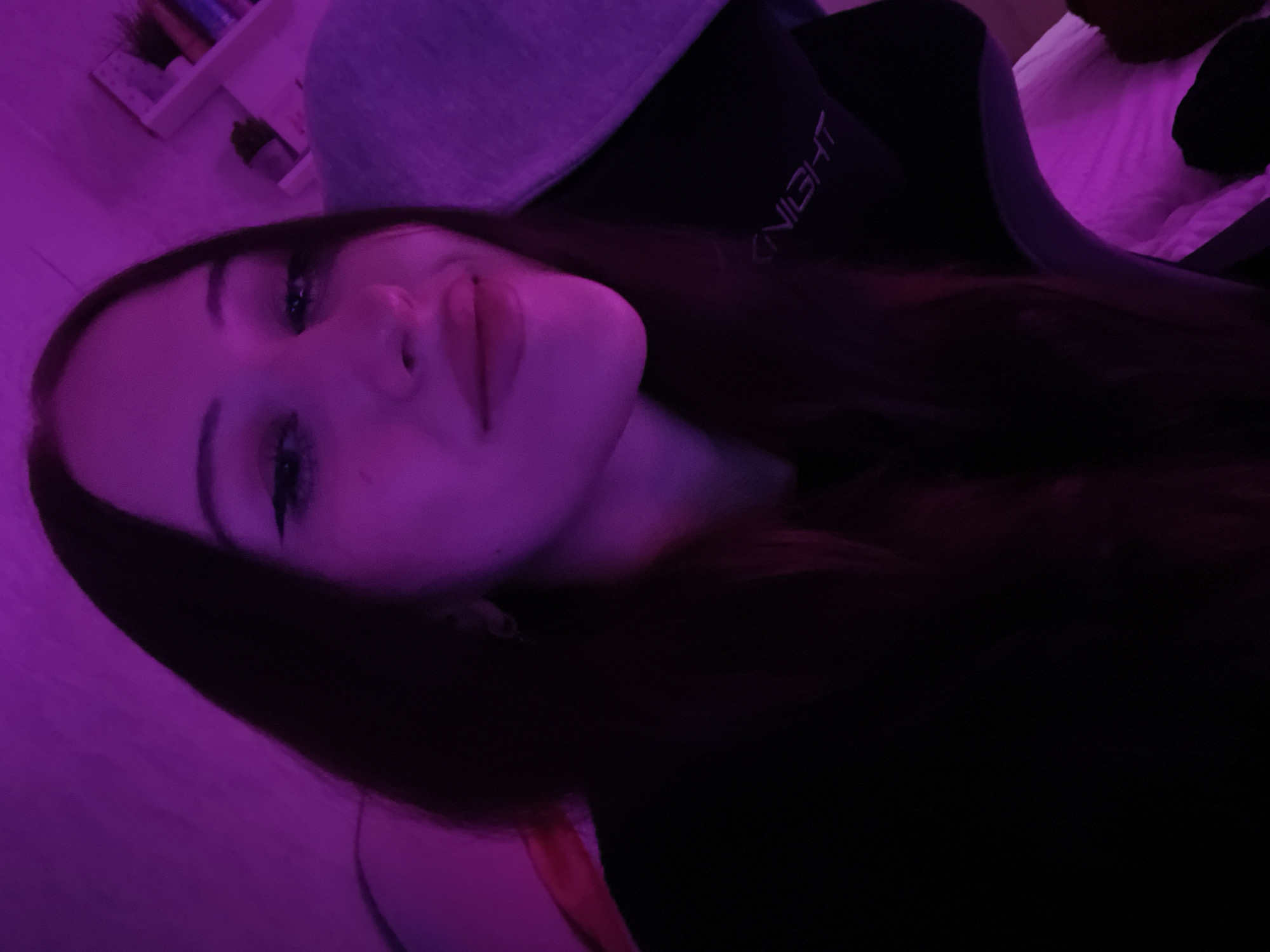 Portrait session documented in Votkinsk, Russia under colored lighting