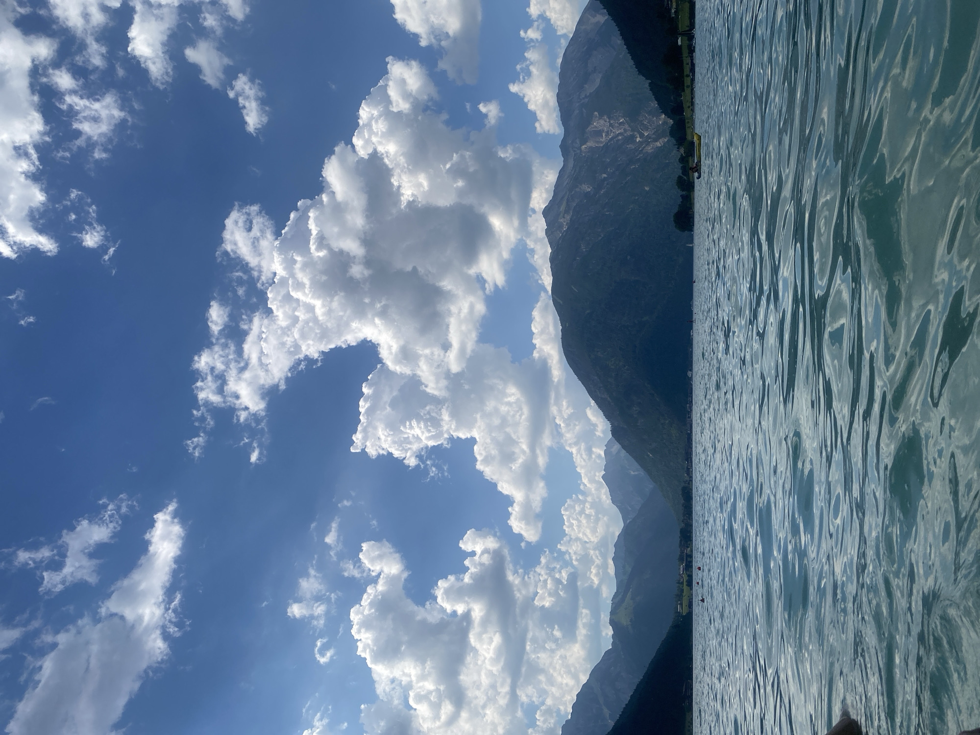 Paddleboarding an Austrian alpine lake on a sunny June day