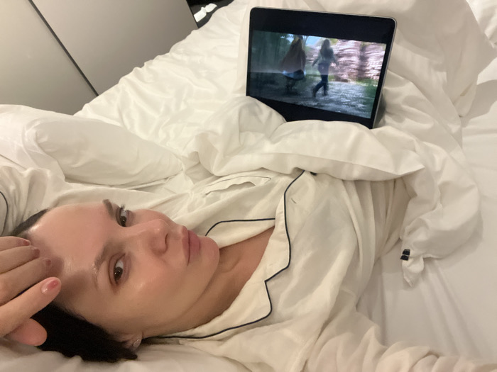 Woman rests in bed in Osaka residence