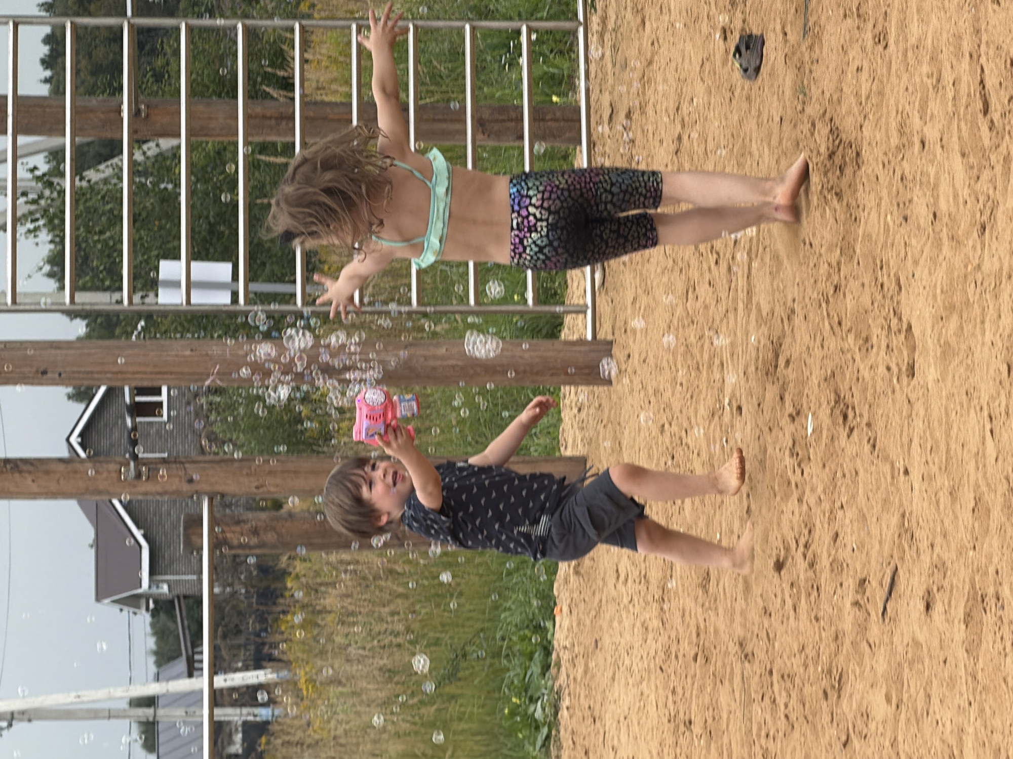 Kids playing in the sand on a summer day in Russia