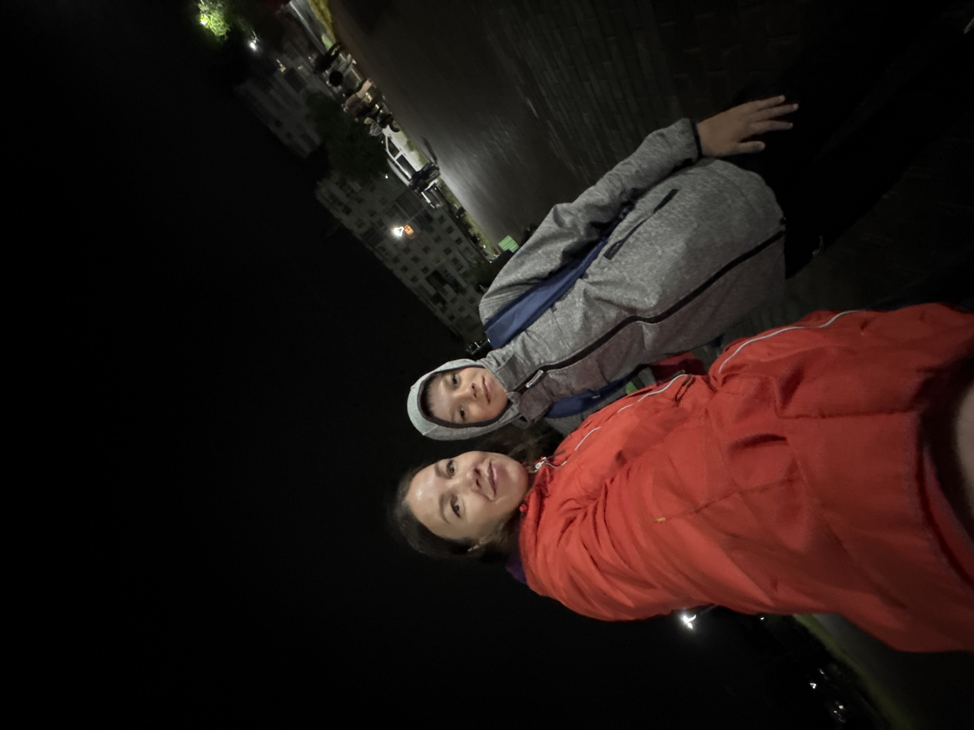 Woman and boy take nighttime selfie in Chaikovsky, Russia