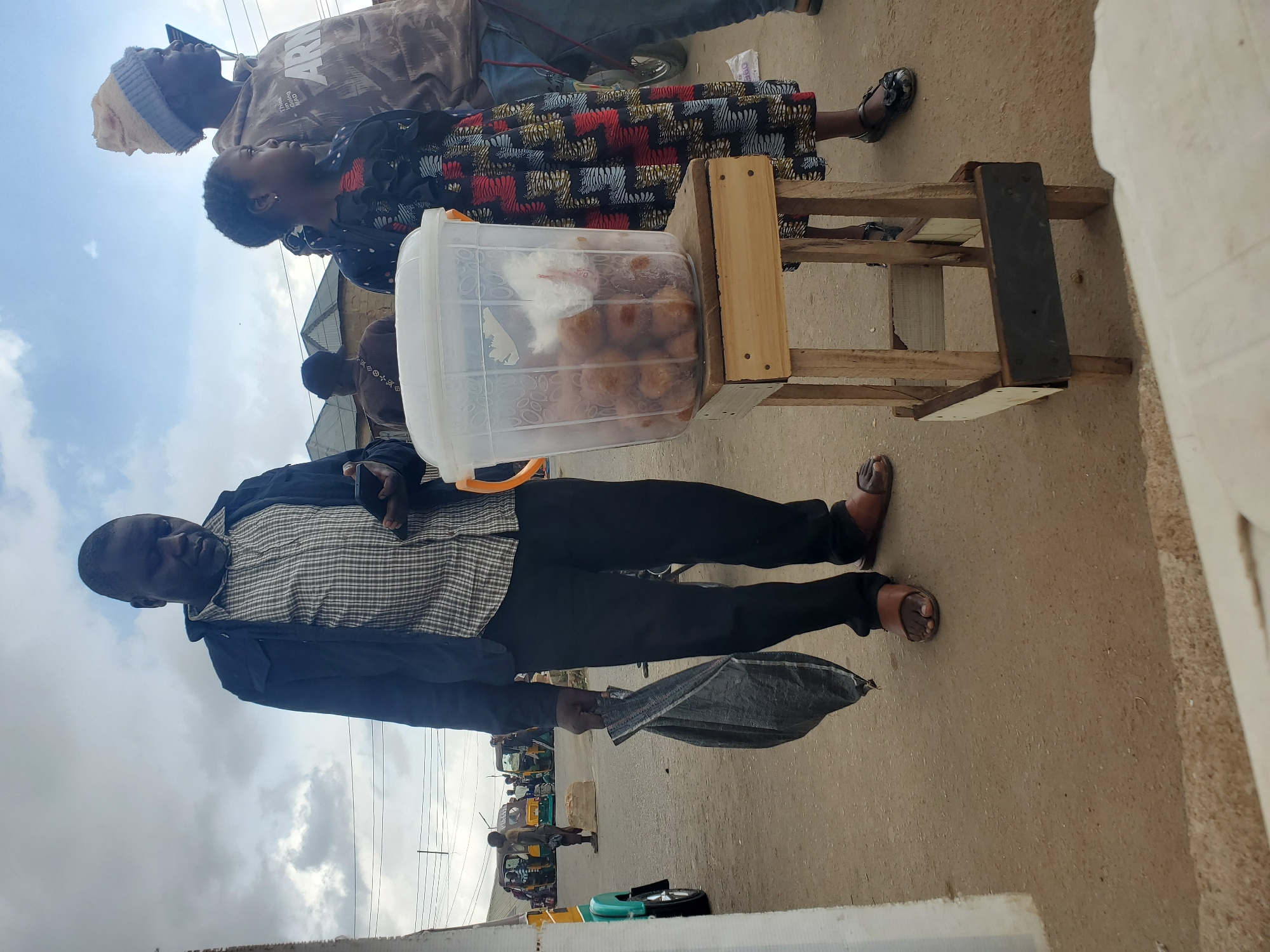 Street life and motorcycle traffic in Gwong, Nigeria