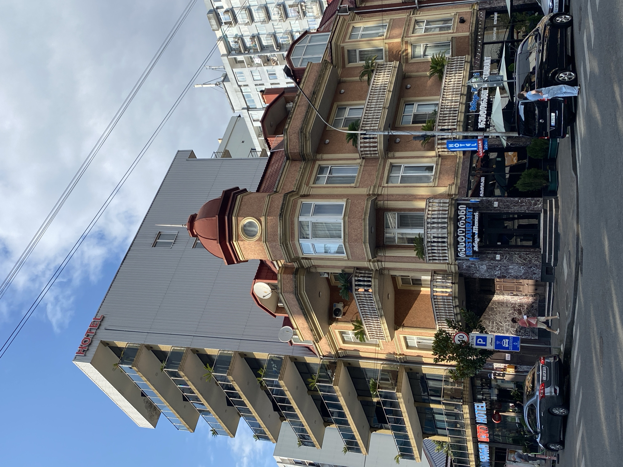 Street-level Batumi: murals, aging architecture, and neighborhood flora