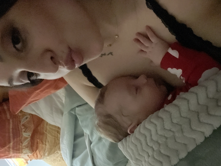 Mother documents evening moments with sleeping baby in Germany