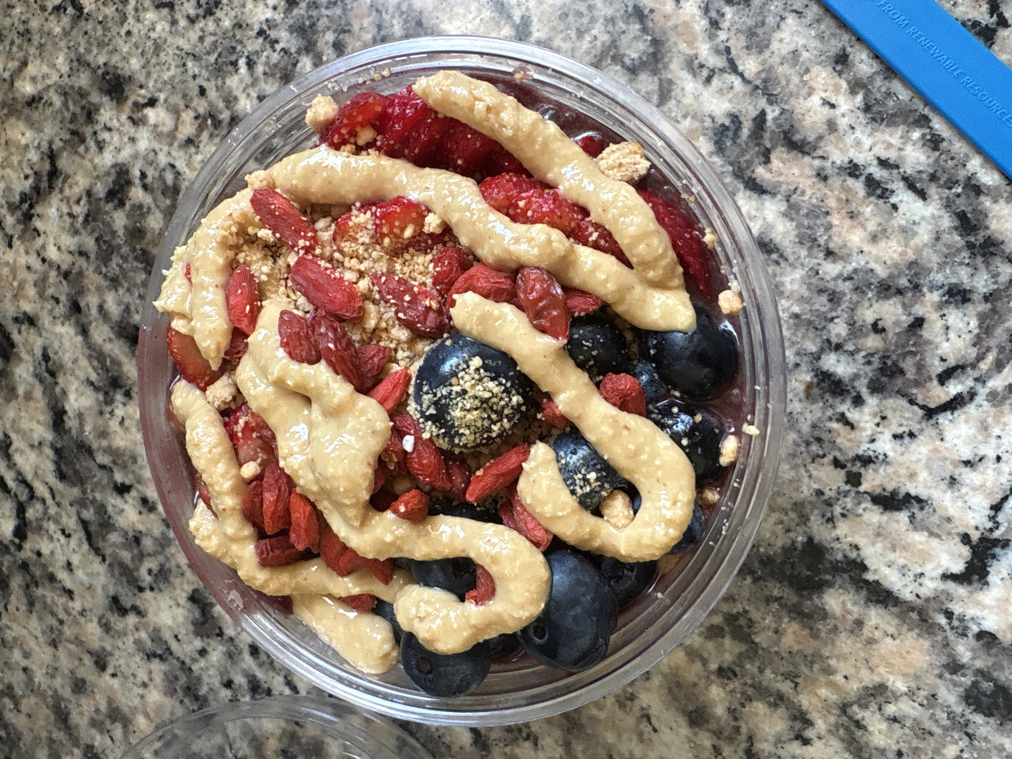 Evening acai bowl preparation captured in Seal Beach kitchen
