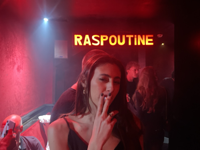 Woman smoking at Raspoutine nightclub in Paris early Saturday