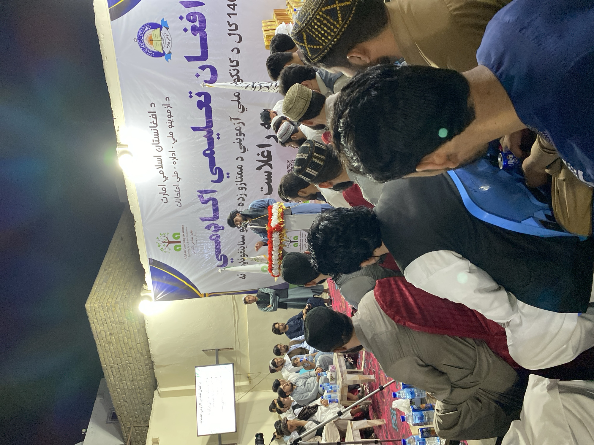 Formal gathering underway in Kandahar, indoors and outdoors