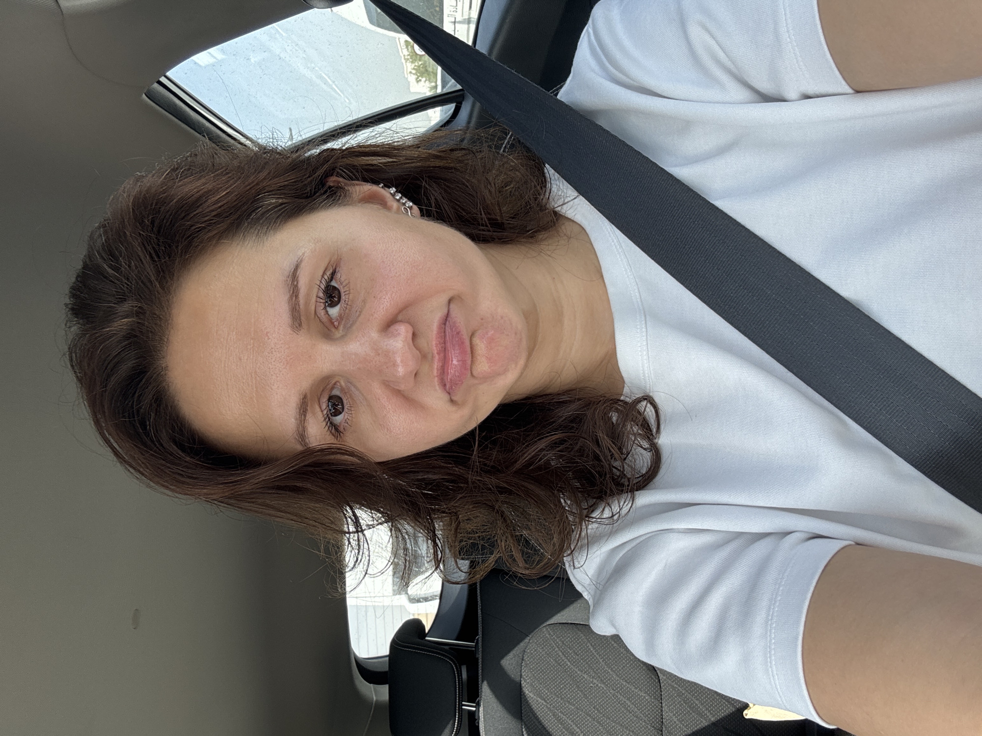 Woman observed in car with open sunroof in Dubai