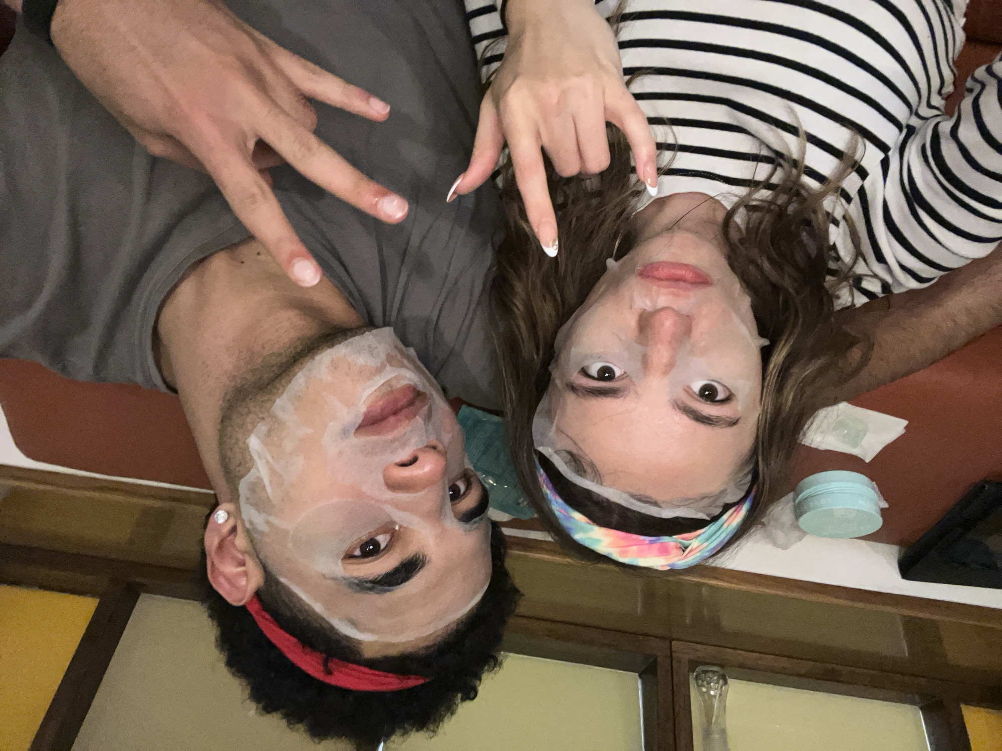 Couple enjoys facial mask skincare routine in Mexico home