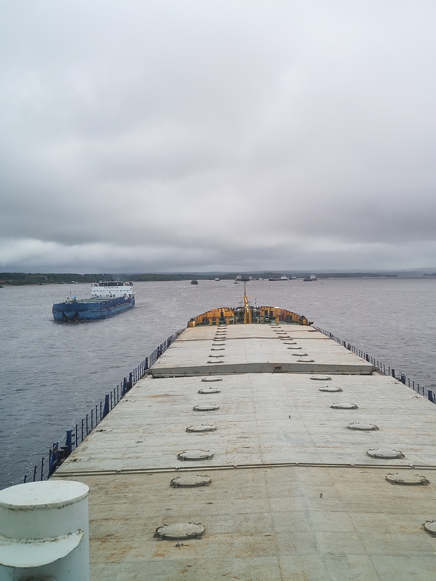 River barge traffic observed from ship deck in Vytegra